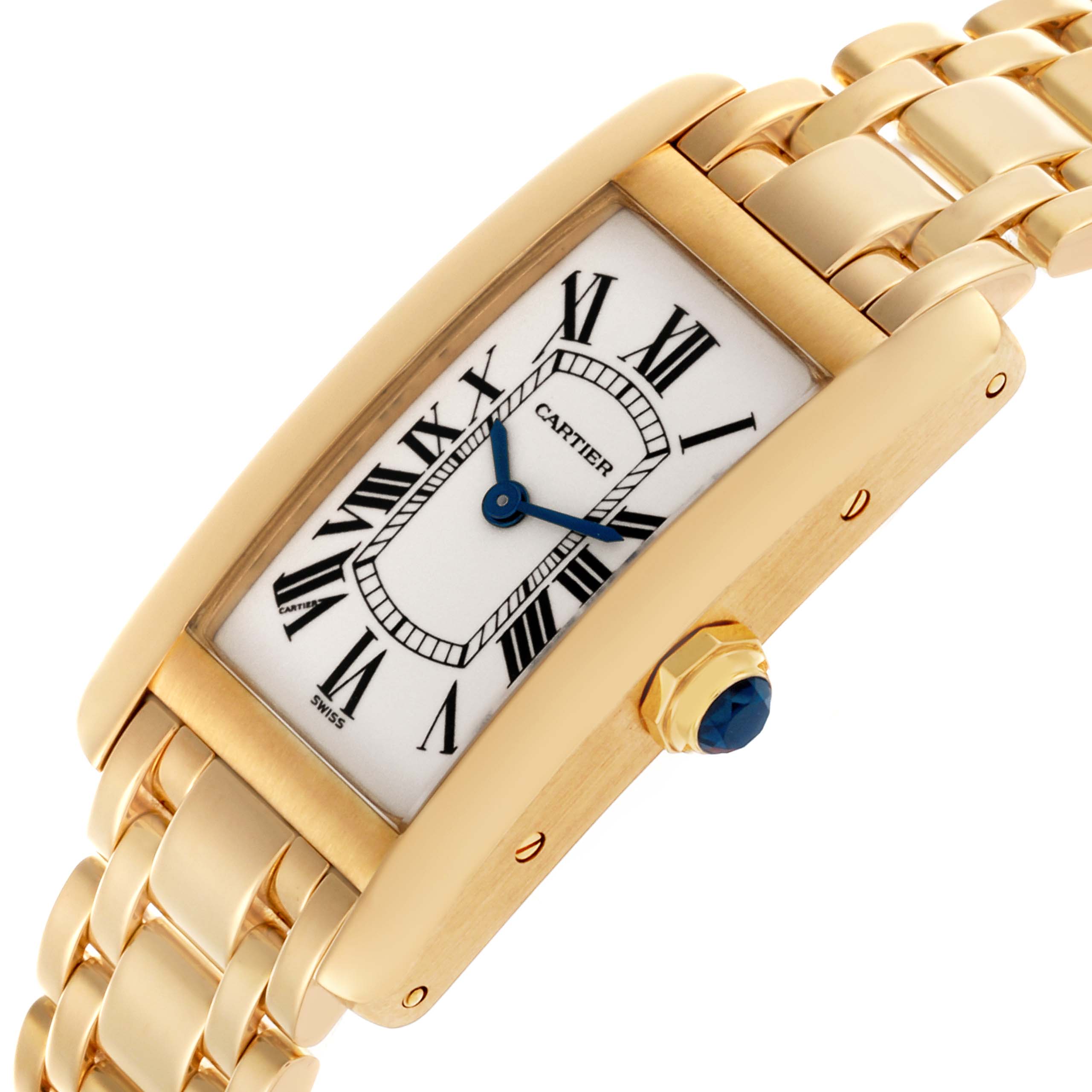 The Cartier Tank Americaine W26015K2 Women's Yellow Gold Silver Dial W26015K2 Women's Yellow Gold Silver Dial watch is shown at an angled view, highlighting the face, Roman numerals, and gold bracelet.