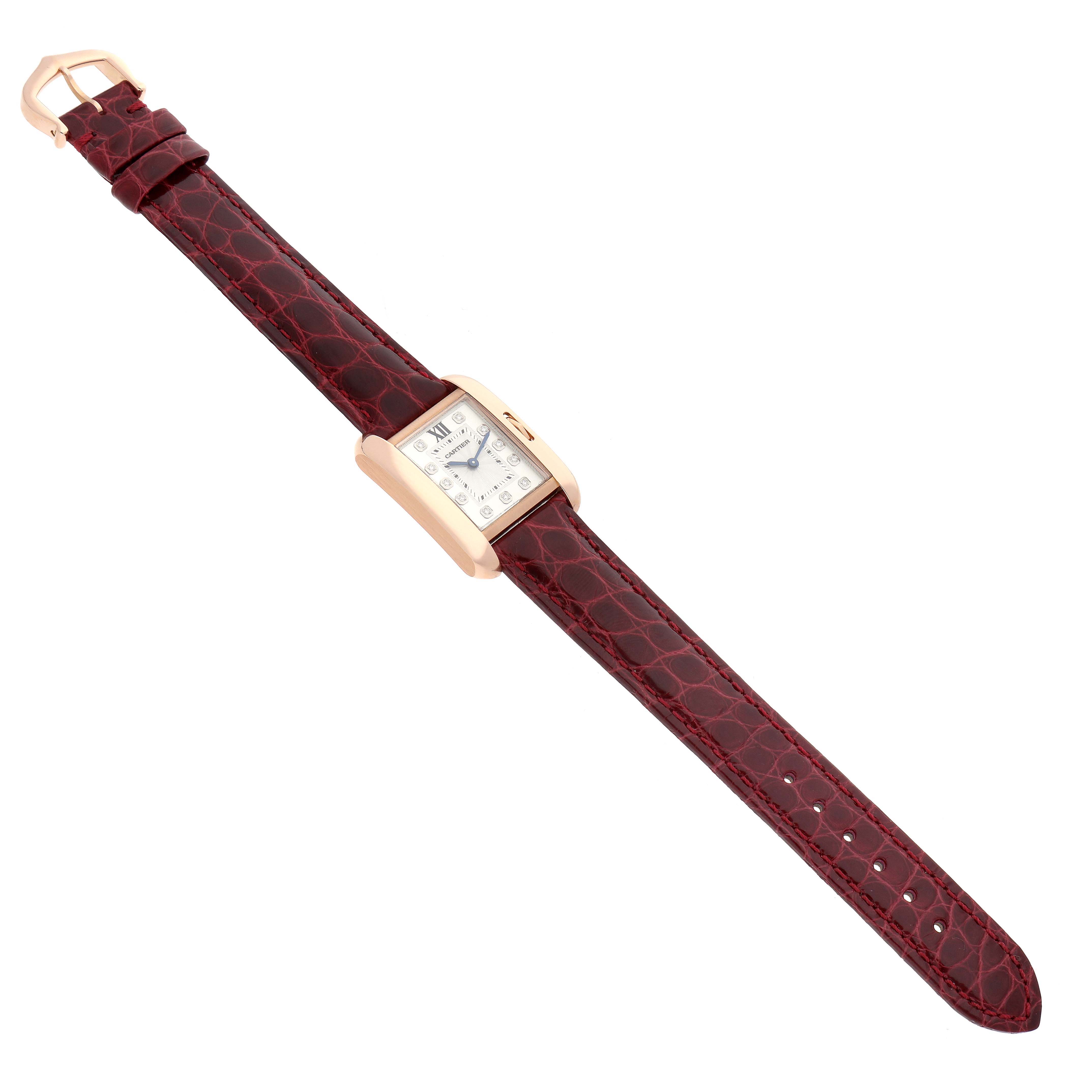 The Cartier Tank Anglaise WJTA0007 Women's Rose Gold Silver Dial watch is shown from a top-down angle, displaying its rectangular case, dial, and leather strap.