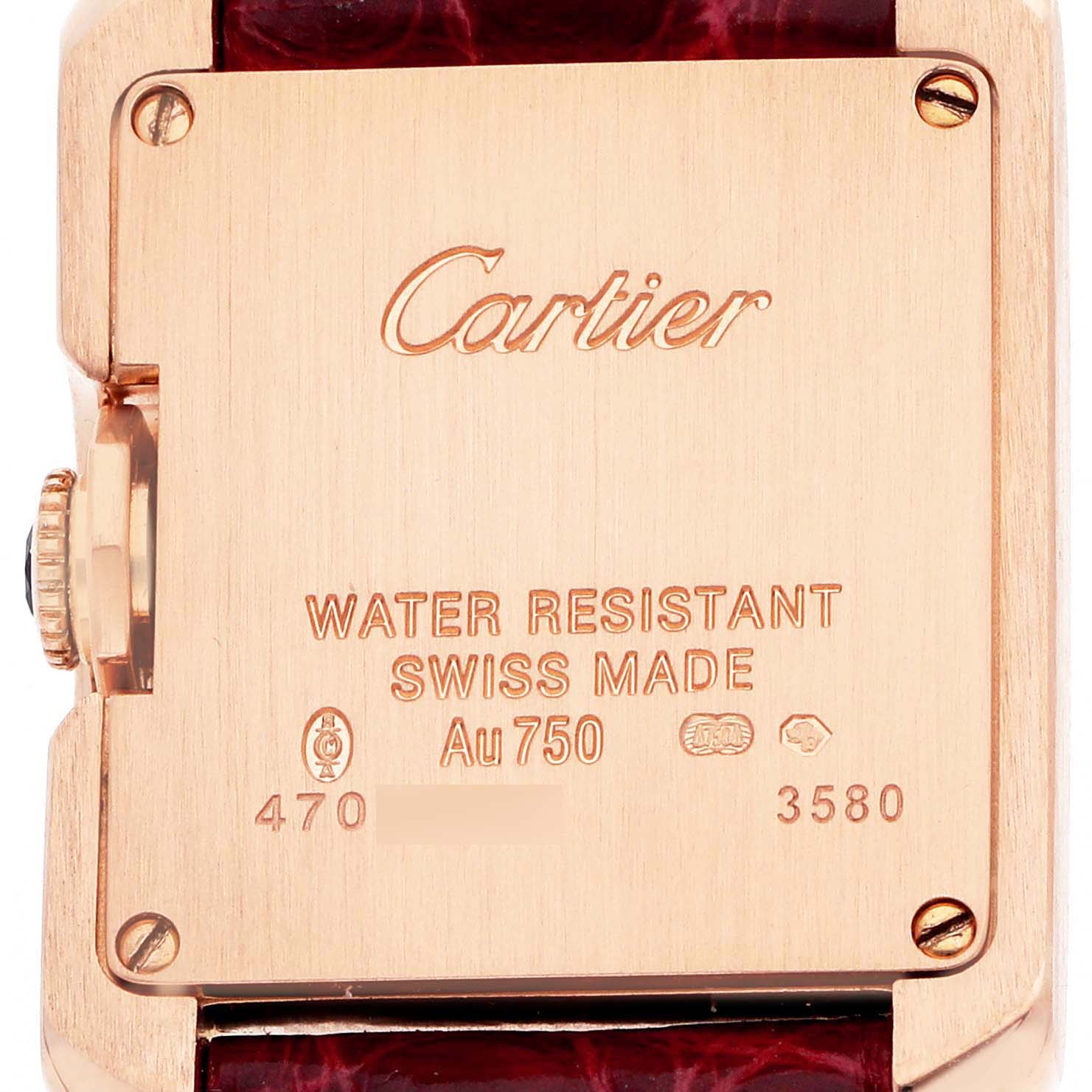 The image shows the back of a Cartier Tank Anglaise WJTA0007 Women's Rose Gold Silver Dial watch, highlighting its engravings and crown.