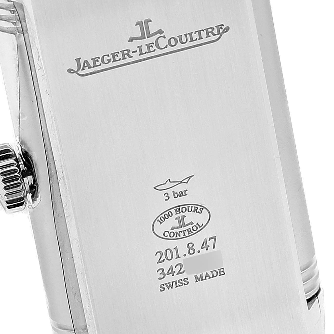 This is a close-up angle of the back of a Jaeger-LeCoultre Reverso watch, displaying the brand logo, model details, and water resistance.