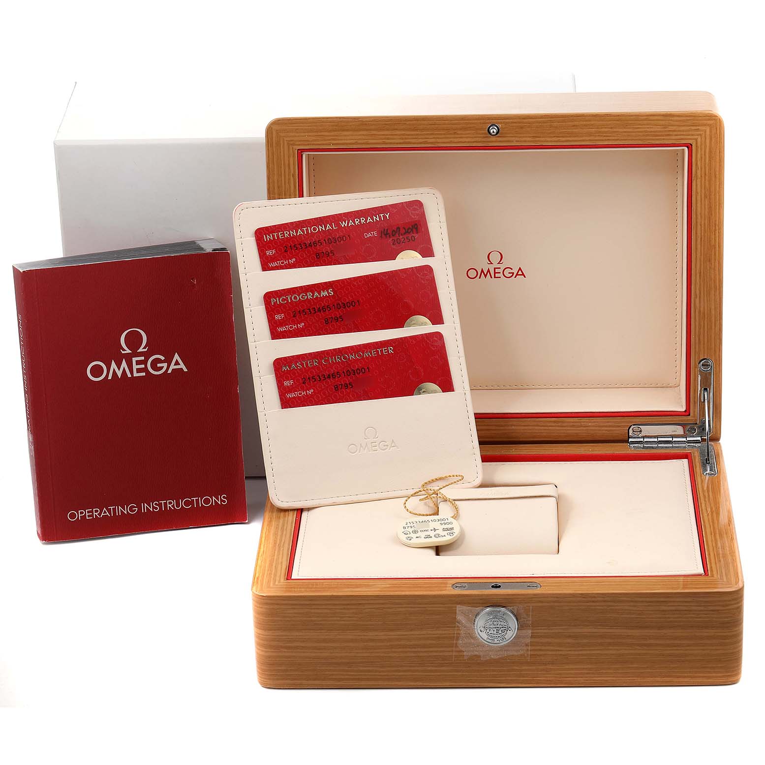 This image shows the packaging and accessories for an Omega Planet Ocean 215.33.46.51.03.001 Men
s Stainless Steel Blue Dial 215.33.46.51.03.001 Men
s Stainless Steel Blue Dial watch, including an instruction manual, warranty cards, and a wooden box.