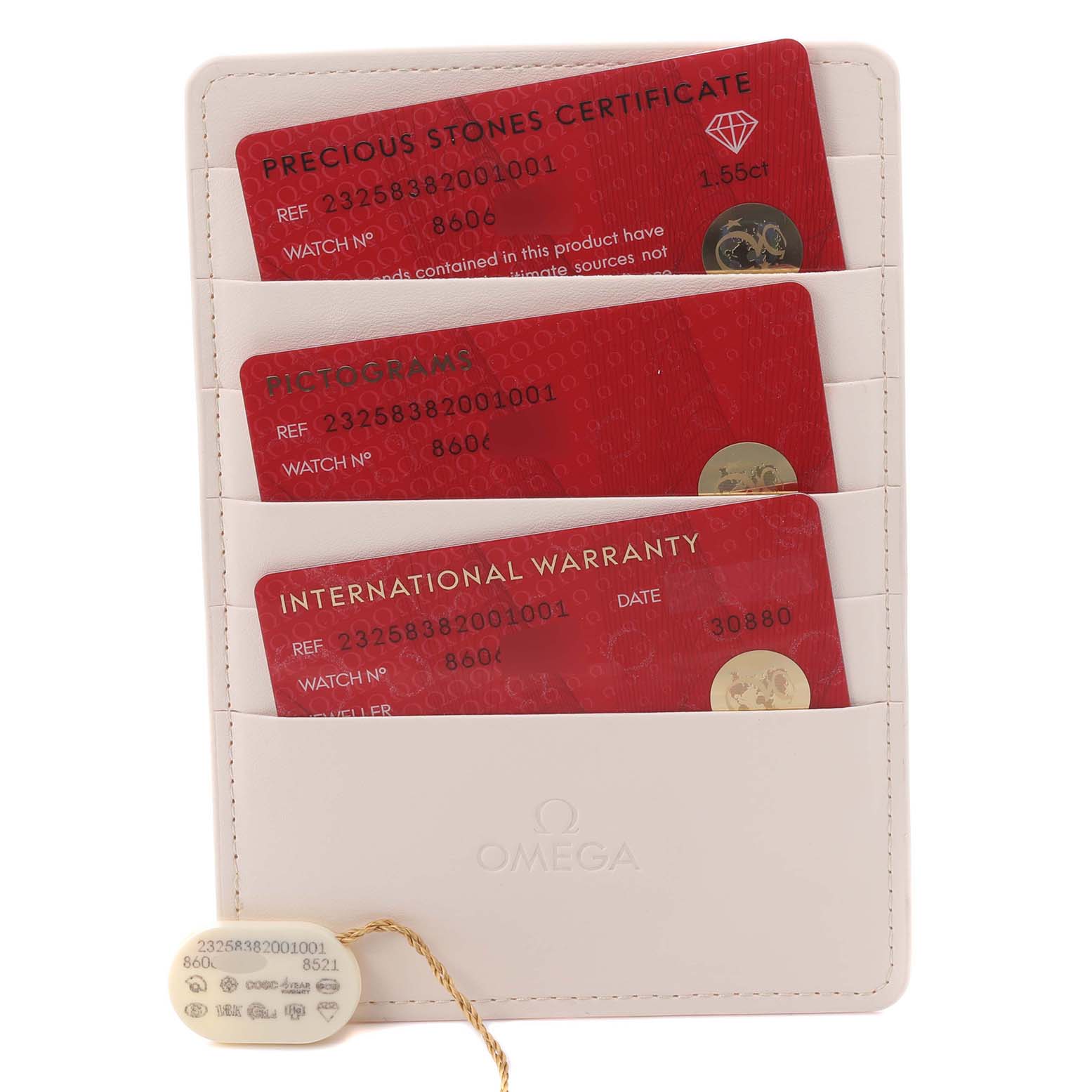 The image shows Omega 232.58.38.20.01.001 Women
s Rose Gold Black Dial 232.58.38.20.01.001 Women
s Rose Gold Black Dial cards and a tag for the Seamaster Planet Ocean Rose Gold Diamond Watch 232.58.38.20.01.001.