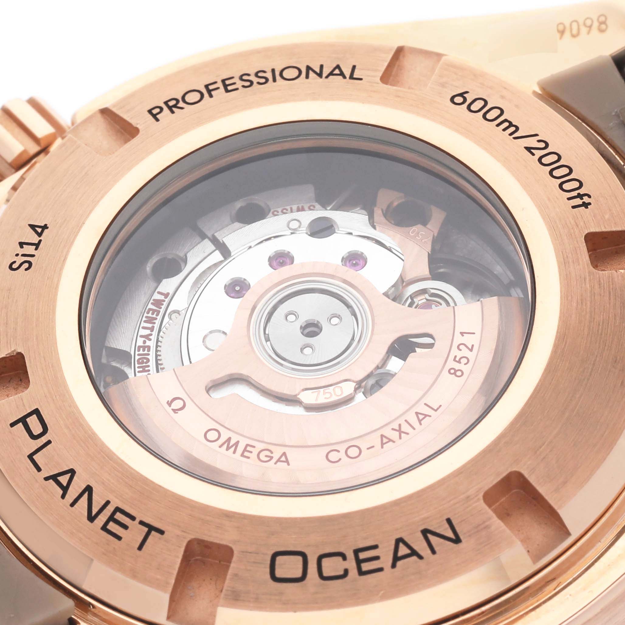 The image shows the case back of the Omega 232.58.38.20.01.001 Women
s Rose Gold Black Dial 232.58.38.20.01.001 Women
s Rose Gold Black Dial Seamaster Planet Ocean Rose Gold, revealing the movement inside.