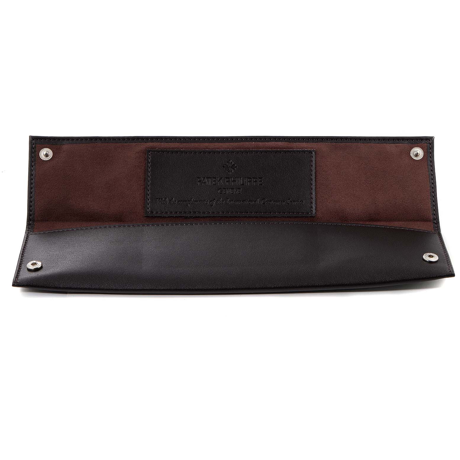This is the leather watch pouch for the Calatrava model by Patek Philippe, shown open and flat.