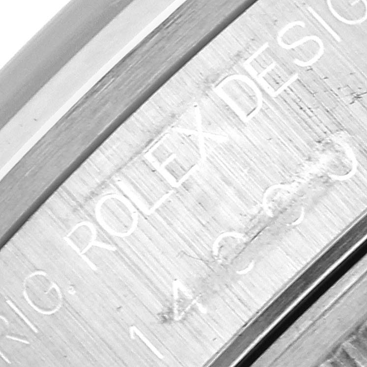 The image shows a close-up of the side engraving on a Rolex Air-King 14000 Men's Stainless Steel Blue Dial 14000 Men's Stainless Steel Blue Dial watch, focusing on the text detail.