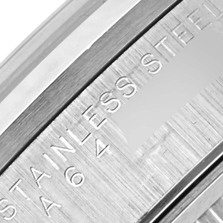 The image shows a close-up of the stainless steel part of a Rolex Air-King 14000 Men's Stainless Steel Blue Dial 14000 Men's Stainless Steel Blue Dial watch, focusing on engraved text.