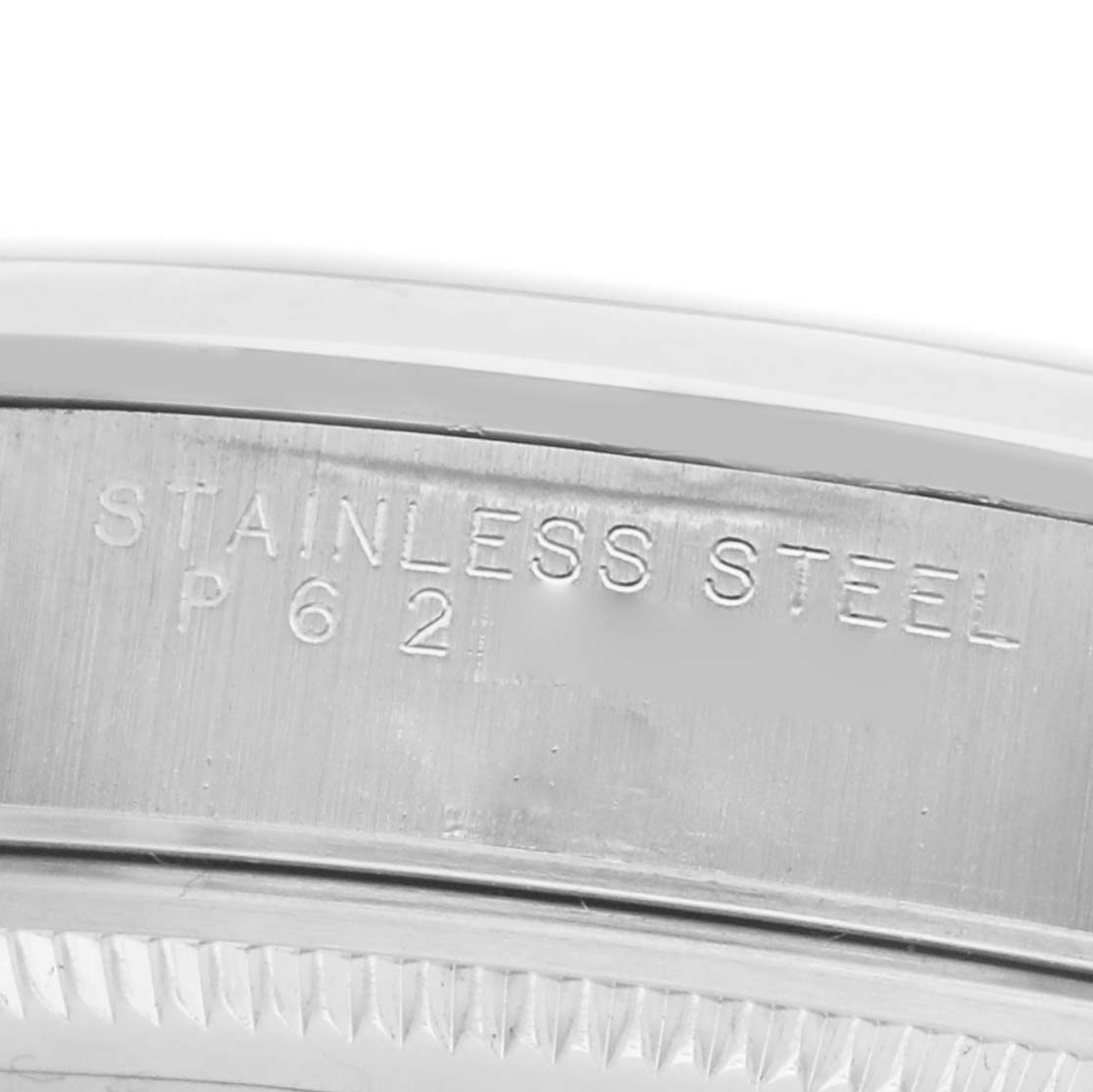 The image shows an engraved stainless steel side of a Rolex Air-King 14000 Men's Stainless Steel Blue Dial watch case.