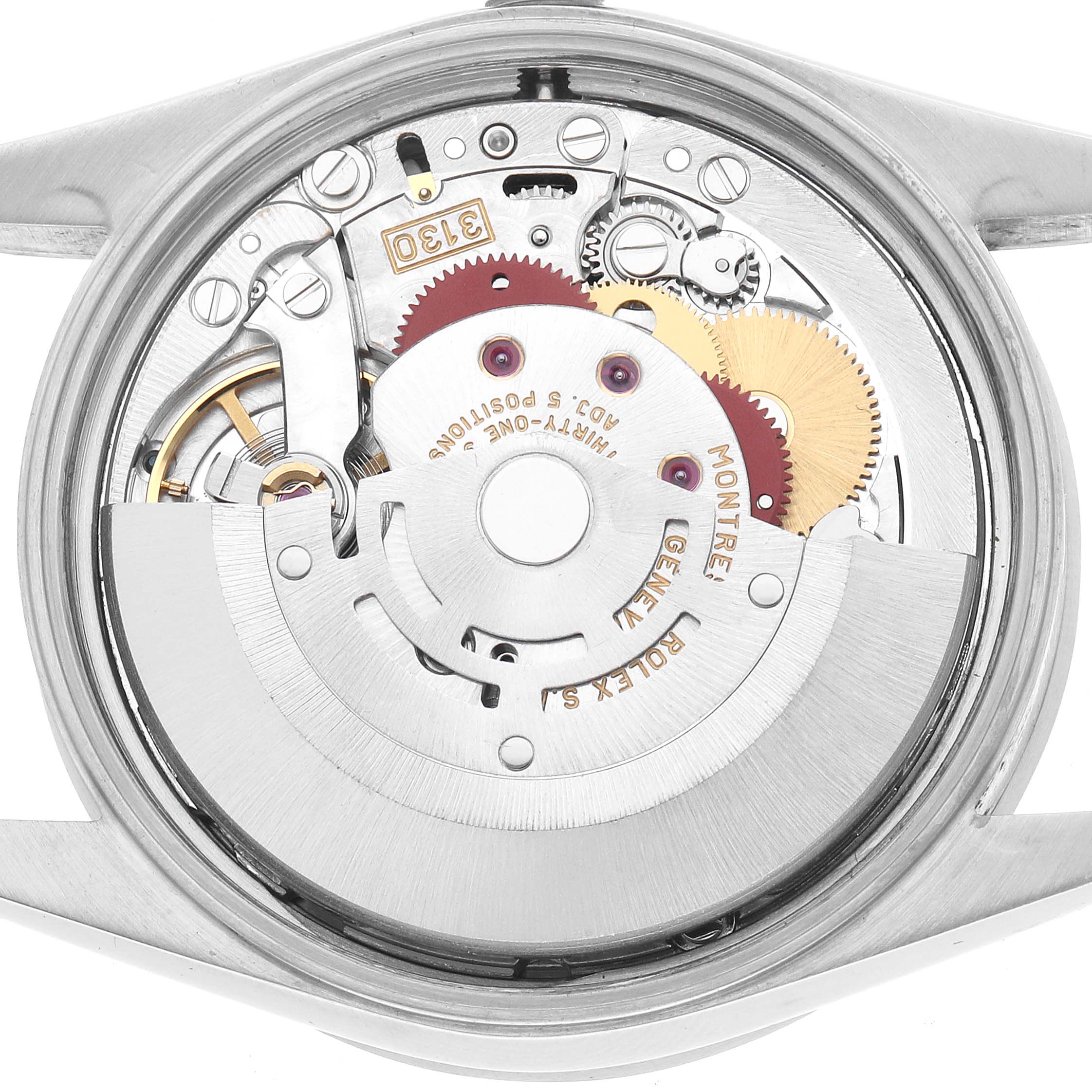The image shows the movement and internal mechanism of a Rolex Air-King 14010 Men's Stainless Steel Silver Dial watch from a rear view.