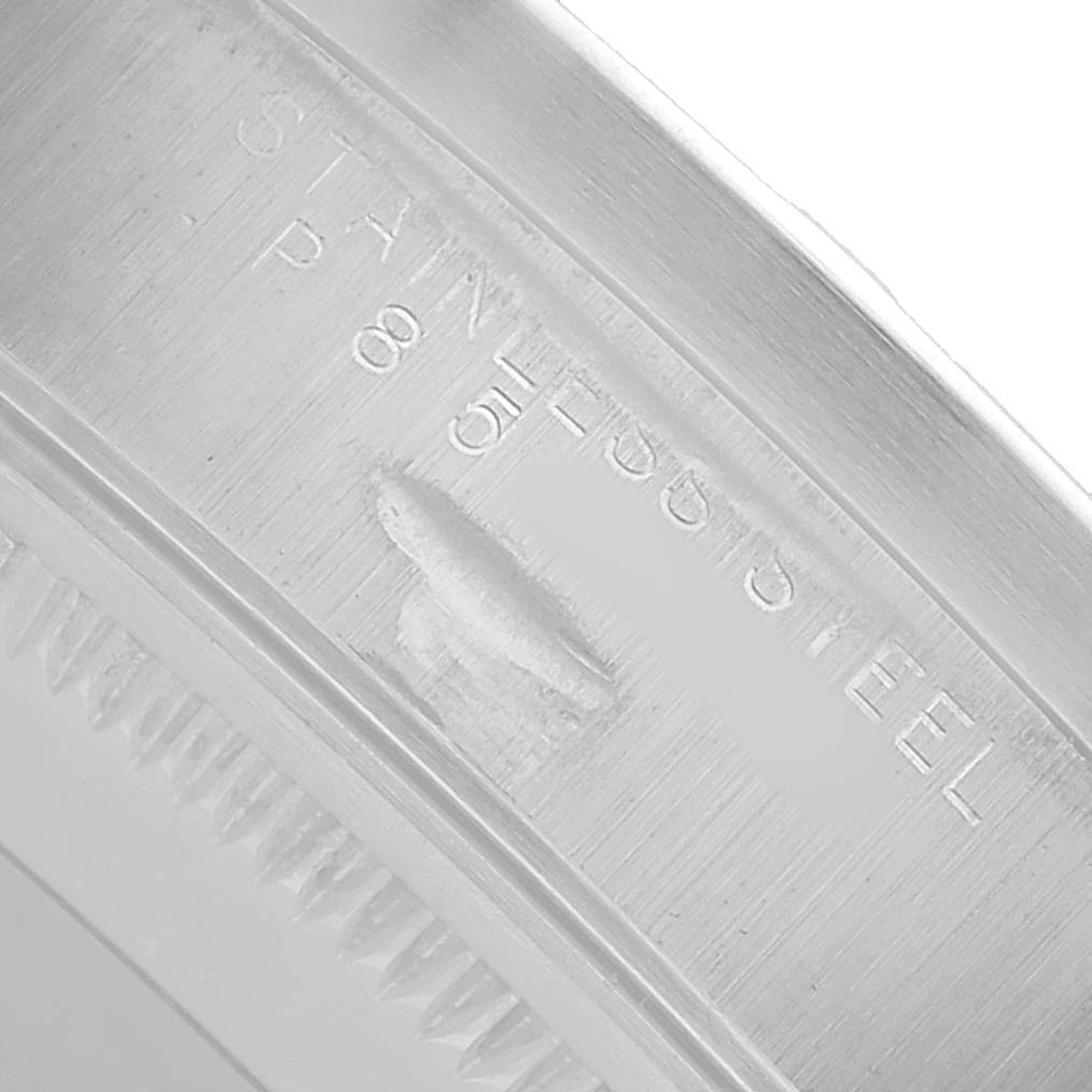 The image shows the inner engraving on the rim of a Rolex Air-King 14010 Men's Stainless Steel Silver Dial watch case from a close-up angle.