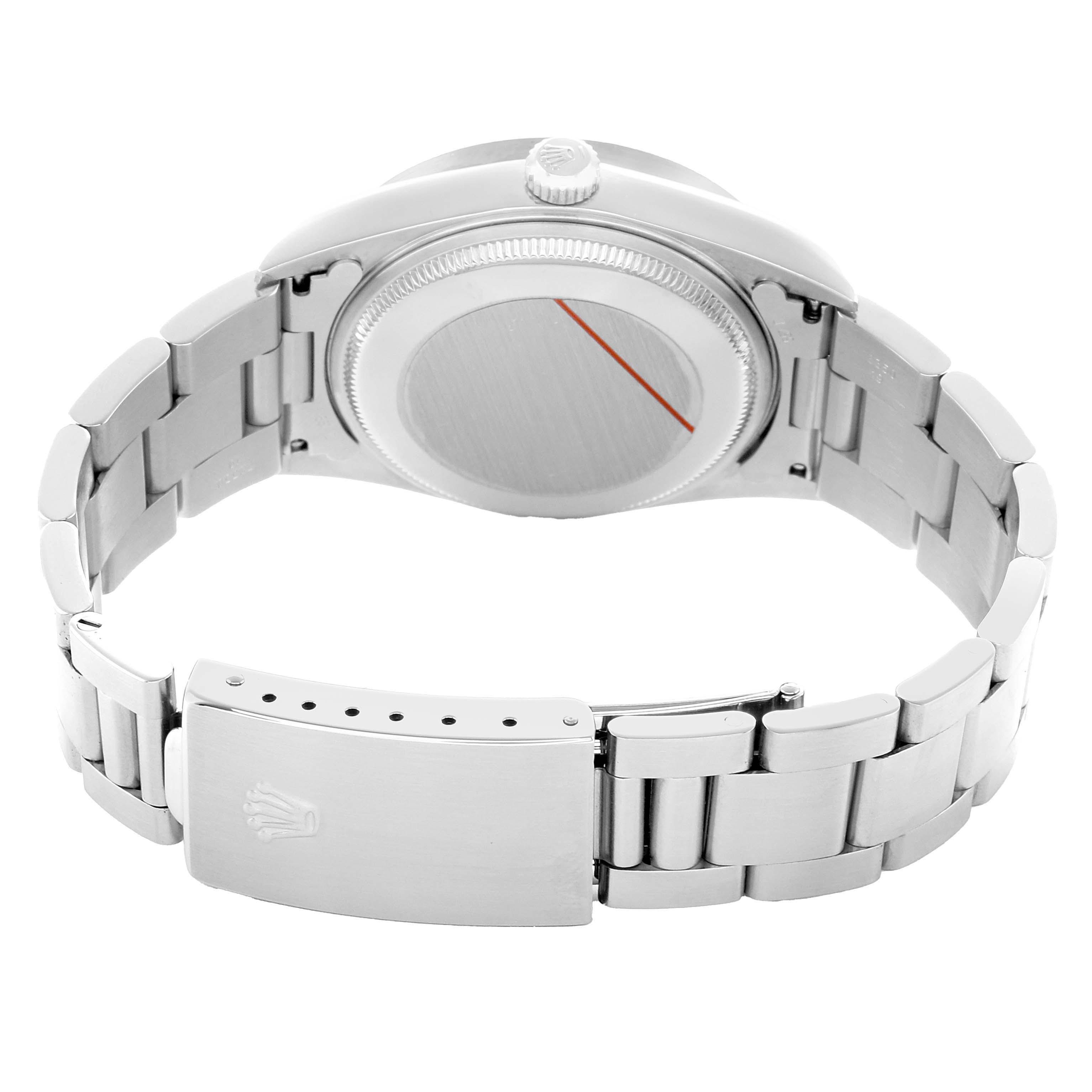 The Rolex Air-King 14010 Men's Stainless Steel Silver Dial watch is shown from the back, highlighting the clasp, bracelet, and case back.