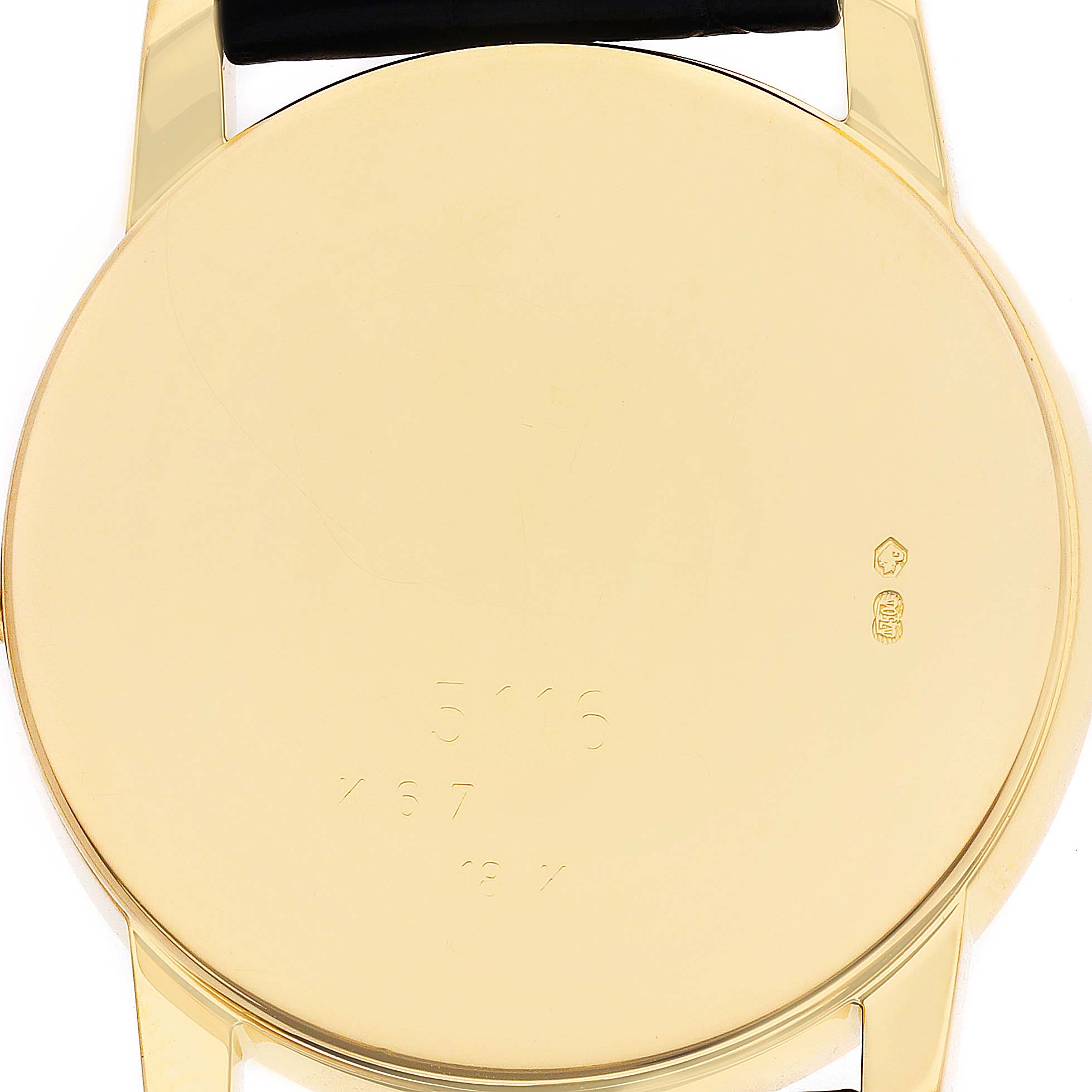 The image shows the back of a Rolex Cellini 5116/8 Men's Yellow Gold White Dial watch case, highlighting its gold finish and engraved markings.
