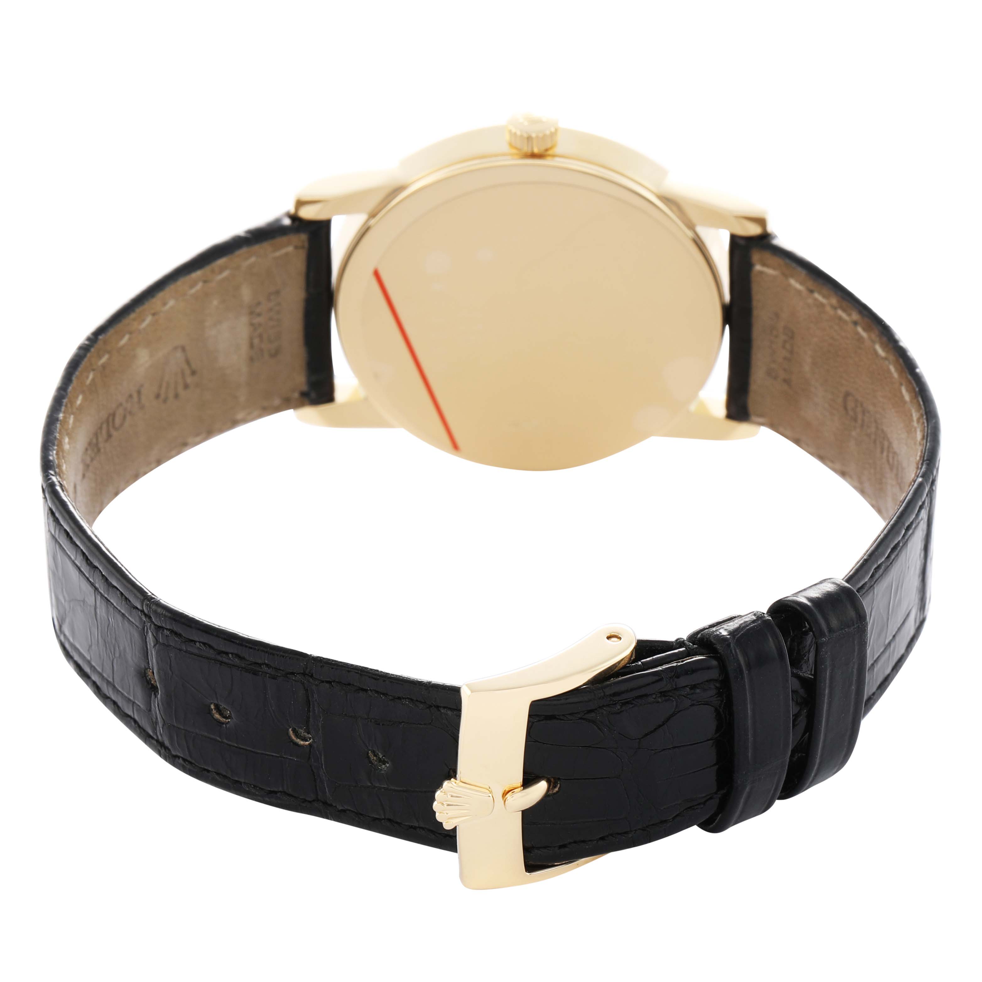 The image shows the back of the Rolex Cellini 5116/8 Men's Yellow Gold White Dial watch, highlighting the clasp, case back, and leather strap.