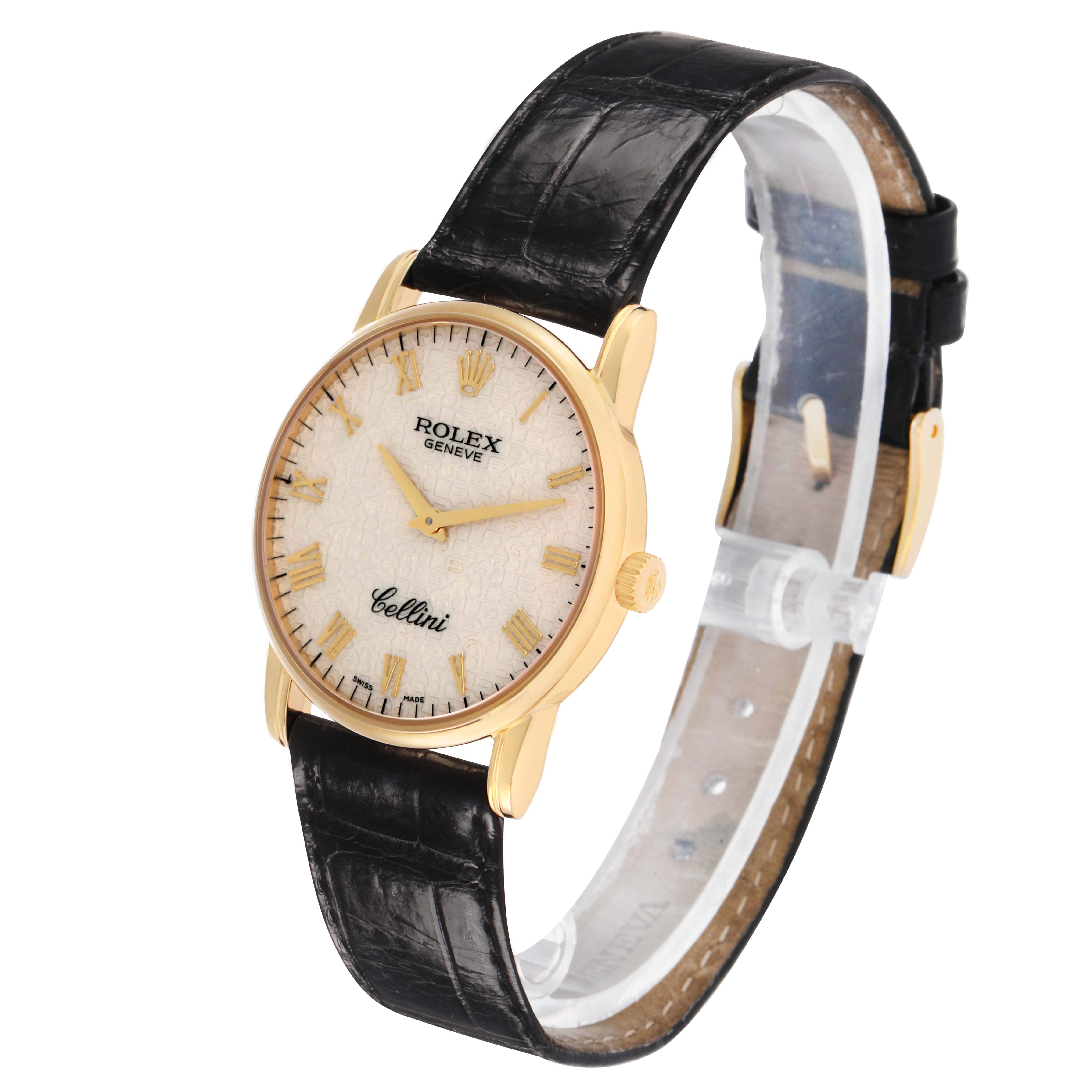 The Rolex Cellini 5116/8 Men's Yellow Gold White Dial watch is shown at a three-quarter angle, displaying its face, gold case, crown, and black leather strap.