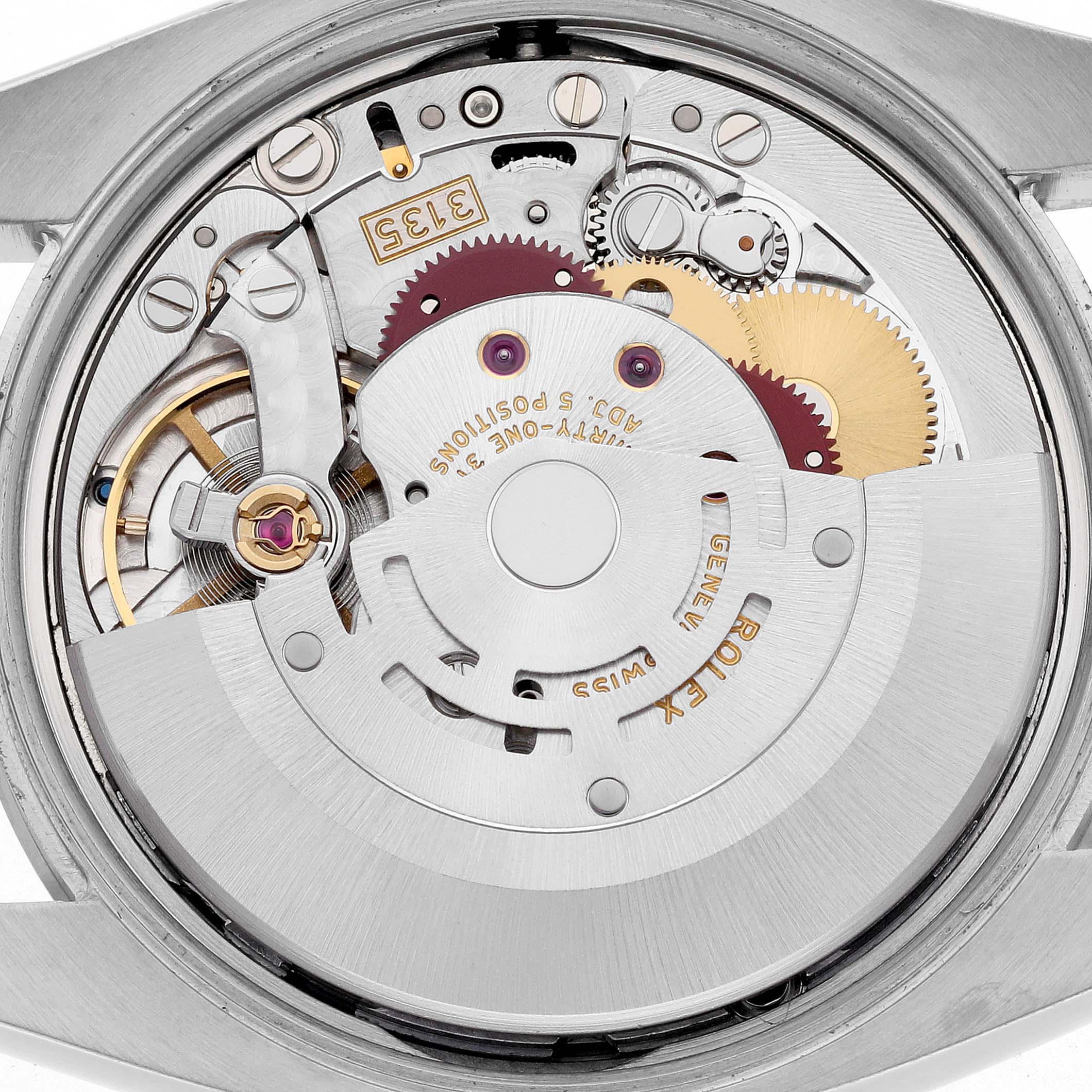 The image shows the movement of a Rolex Date 115200 Men's Stainless Steel White Dial 115200 Men's Stainless Steel White Dial model from a top view, displaying gears and parts of the watch mechanism.