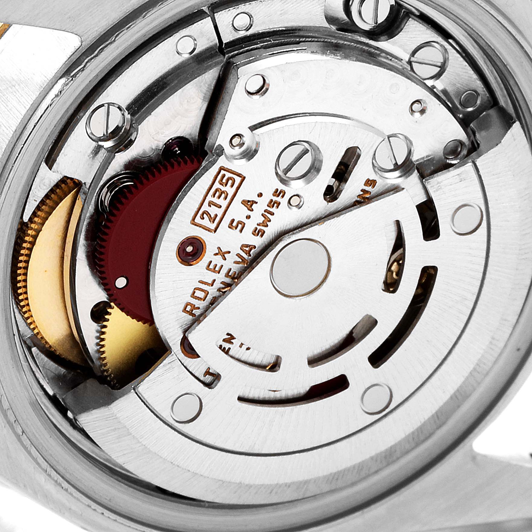 This close-up shows the internal movement mechanism of a Rolex Datejust 69173 Women
s Steel and Gold (two tone) Champagne Dial 69173 Women
s Steel and Gold (two tone) Champagne Dial watch, highlighting intricate gears and components.