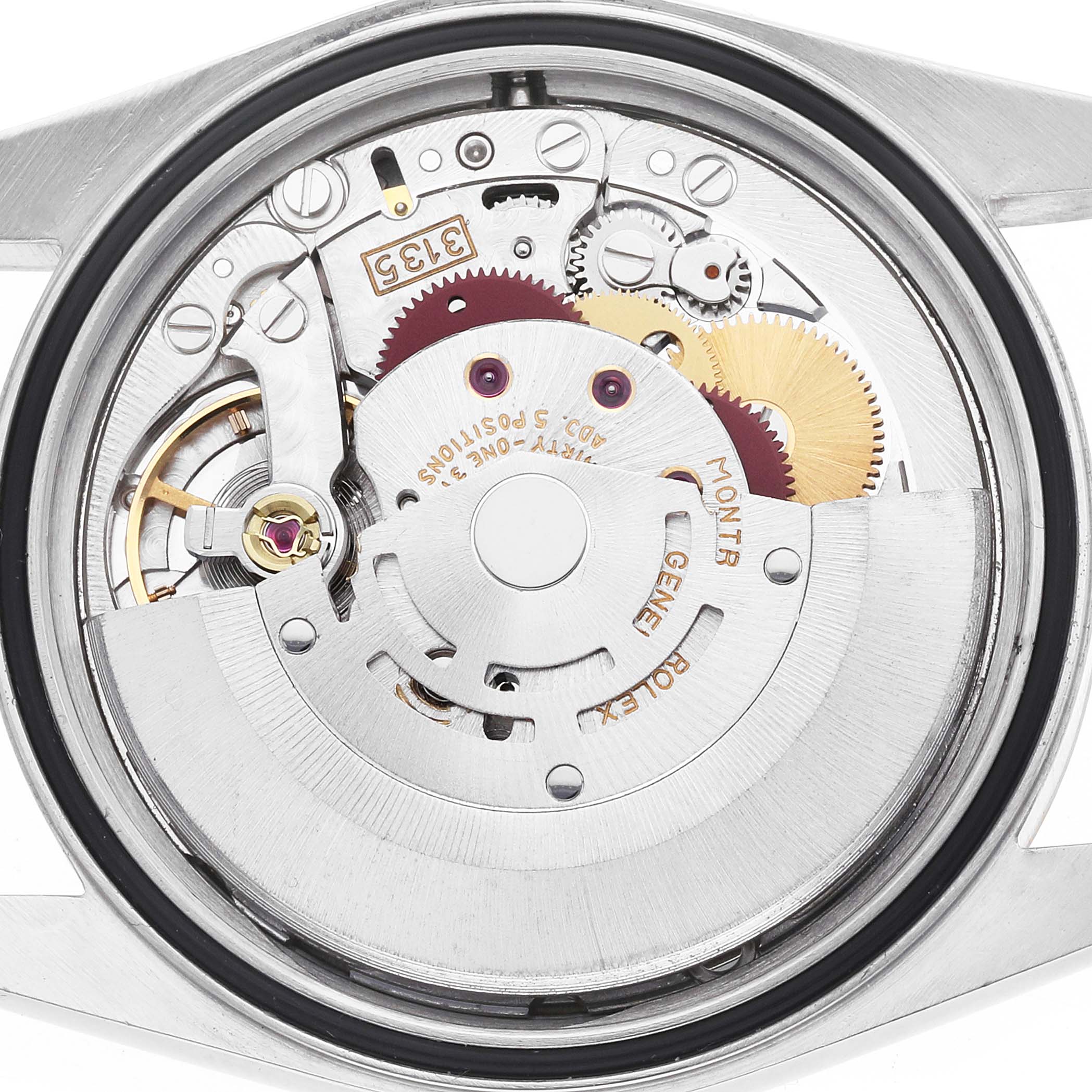 The image shows the movement of a Rolex Datejust 16233 Men's Steel and Gold (two tone) Champagne Dial watch from a rear angle, revealing the intricate gears and components.