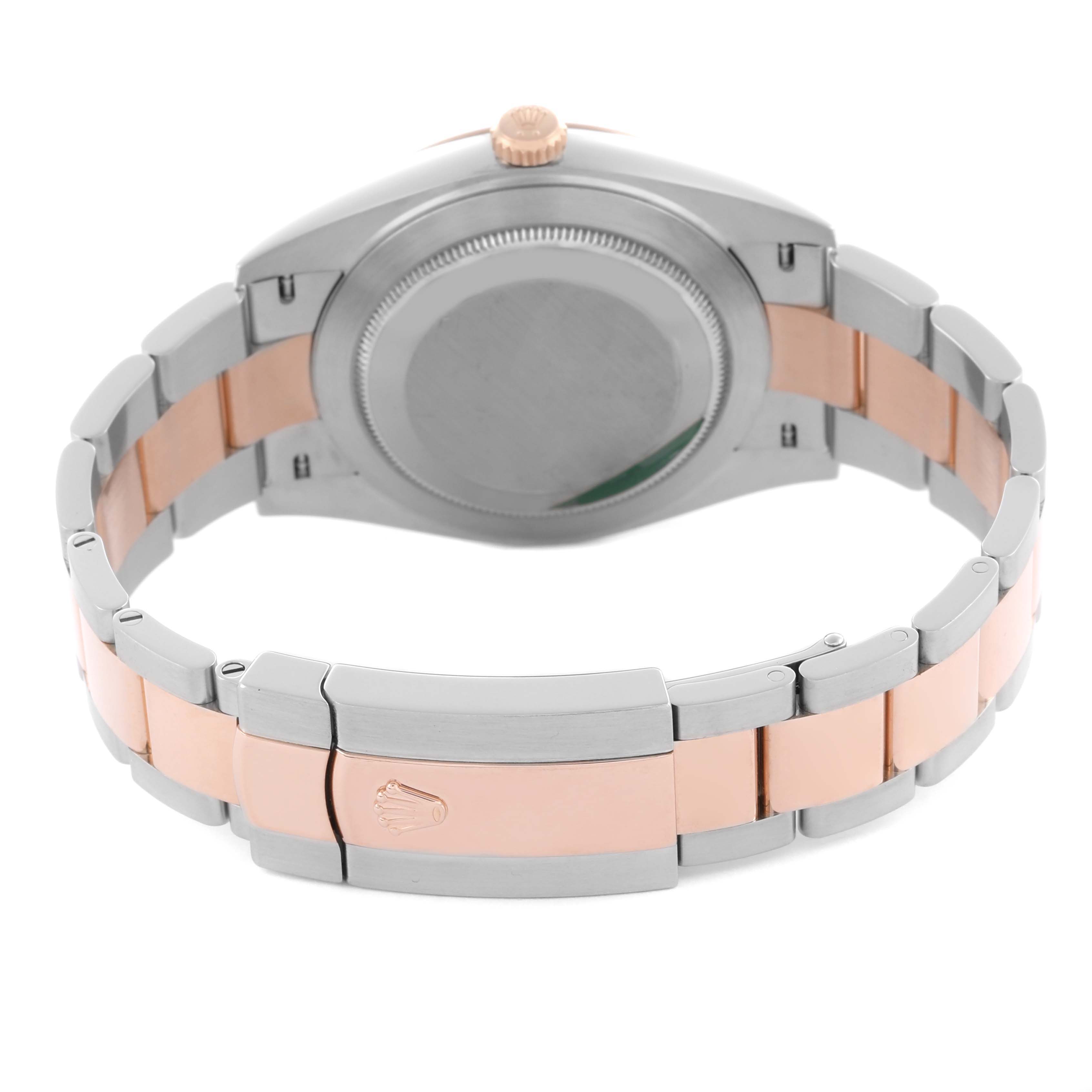 The image shows the back of a Rolex Datejust 41 126331 Men
s Steel and Gold (two tone) Brown Dial 126331 Men
s Steel and Gold (two tone) Brown Dial, highlighting the caseback, two-tone bracelet, and clasp.