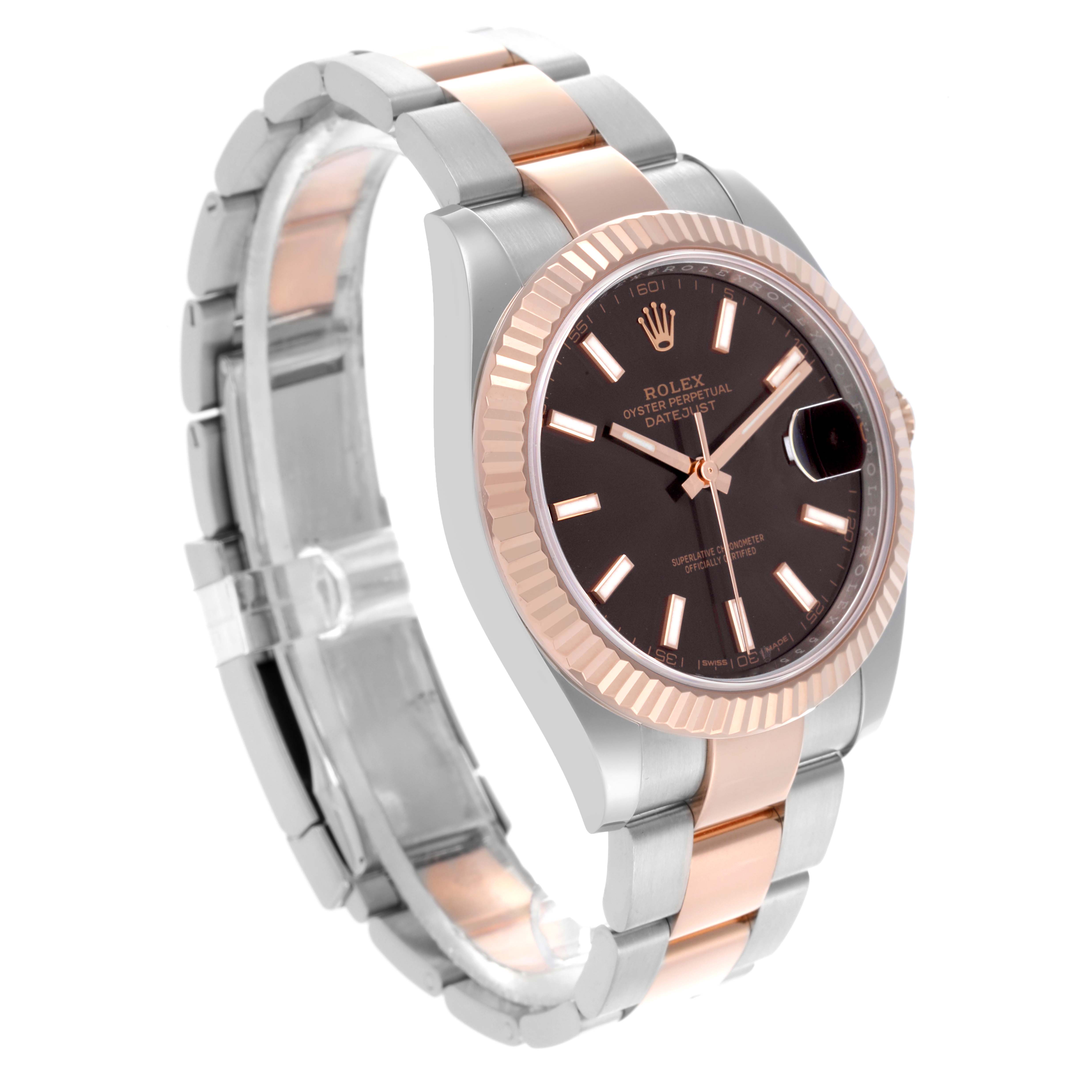 The Rolex Datejust 41 126331 Men
s Steel and Gold (two tone) Brown Dial 126331 Men
s Steel and Gold (two tone) Brown Dial is shown at a slight side angle, highlighting the bezel, dial, bracelet, and clasp.