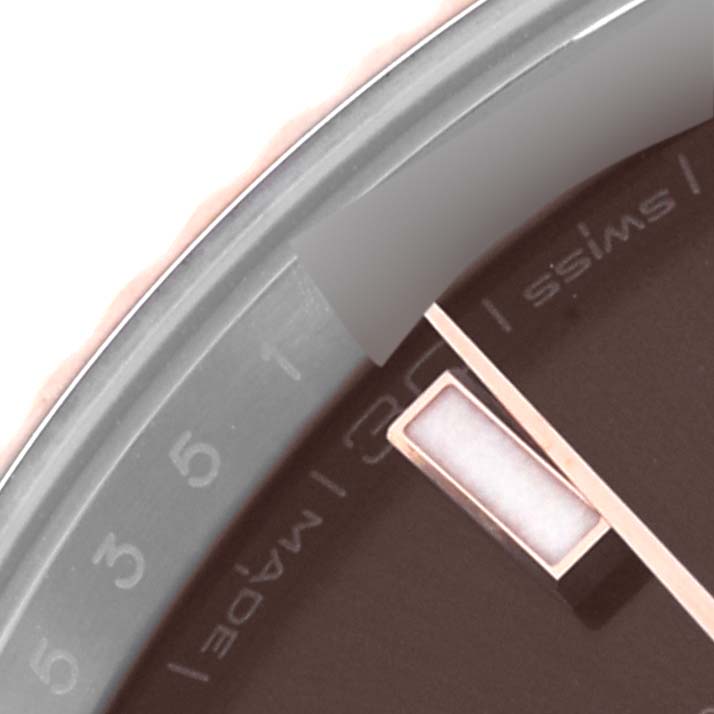 The image shows a close-up of the dial and bezel edge of the Rolex Datejust 41 126331 Men
s Steel and Gold (two tone) Brown Dial 126331 Men
s Steel and Gold (two tone) Brown Dial.