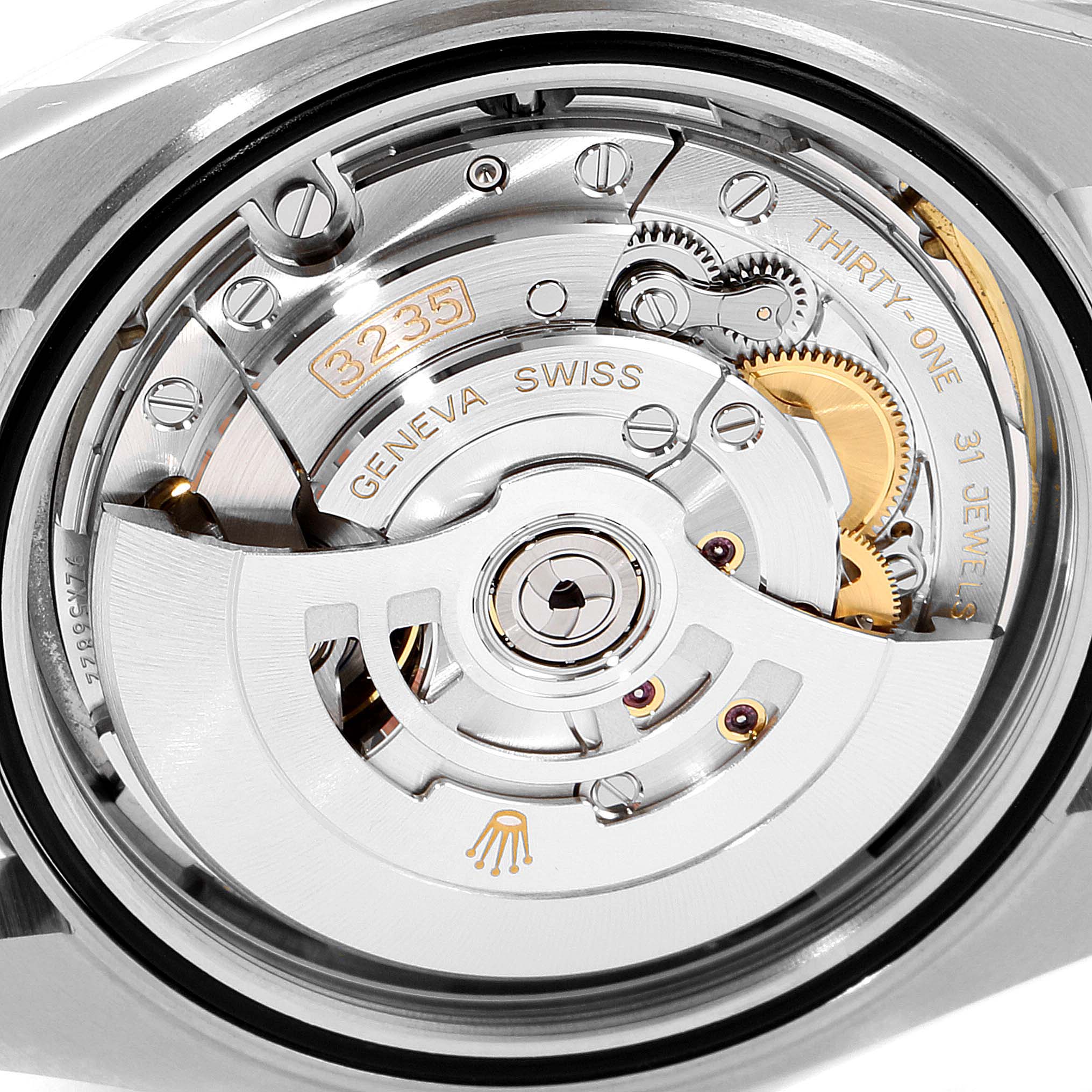 This close-up image shows the intricate movement mechanism of the Rolex Datejust 41 126300 Men
s Stainless Steel White Dial 126300 Men
s Stainless Steel White Dial watch.