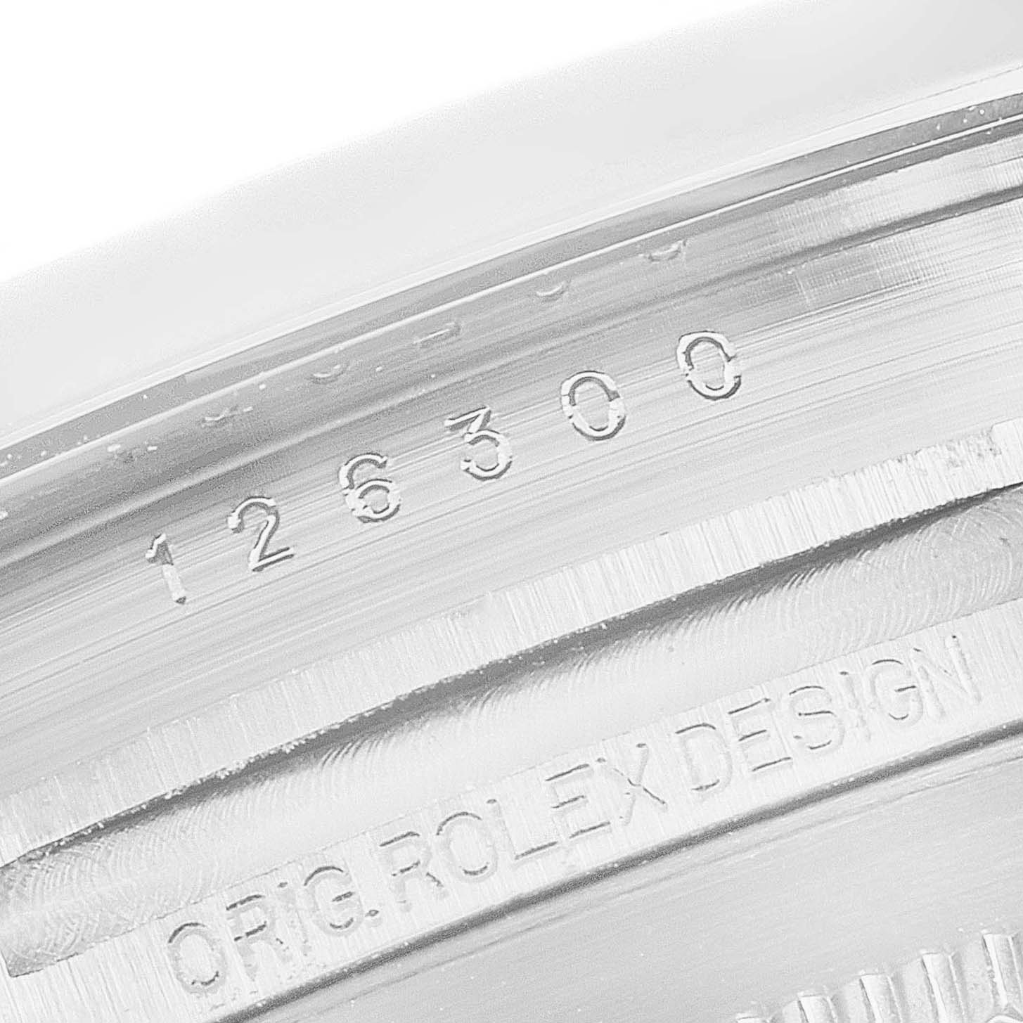 The image shows a close-up of the reference number and branding on the inner rim of a Rolex Datejust 41 126300 Men
s Stainless Steel White Dial 126300 Men
s Stainless Steel White Dial watch.