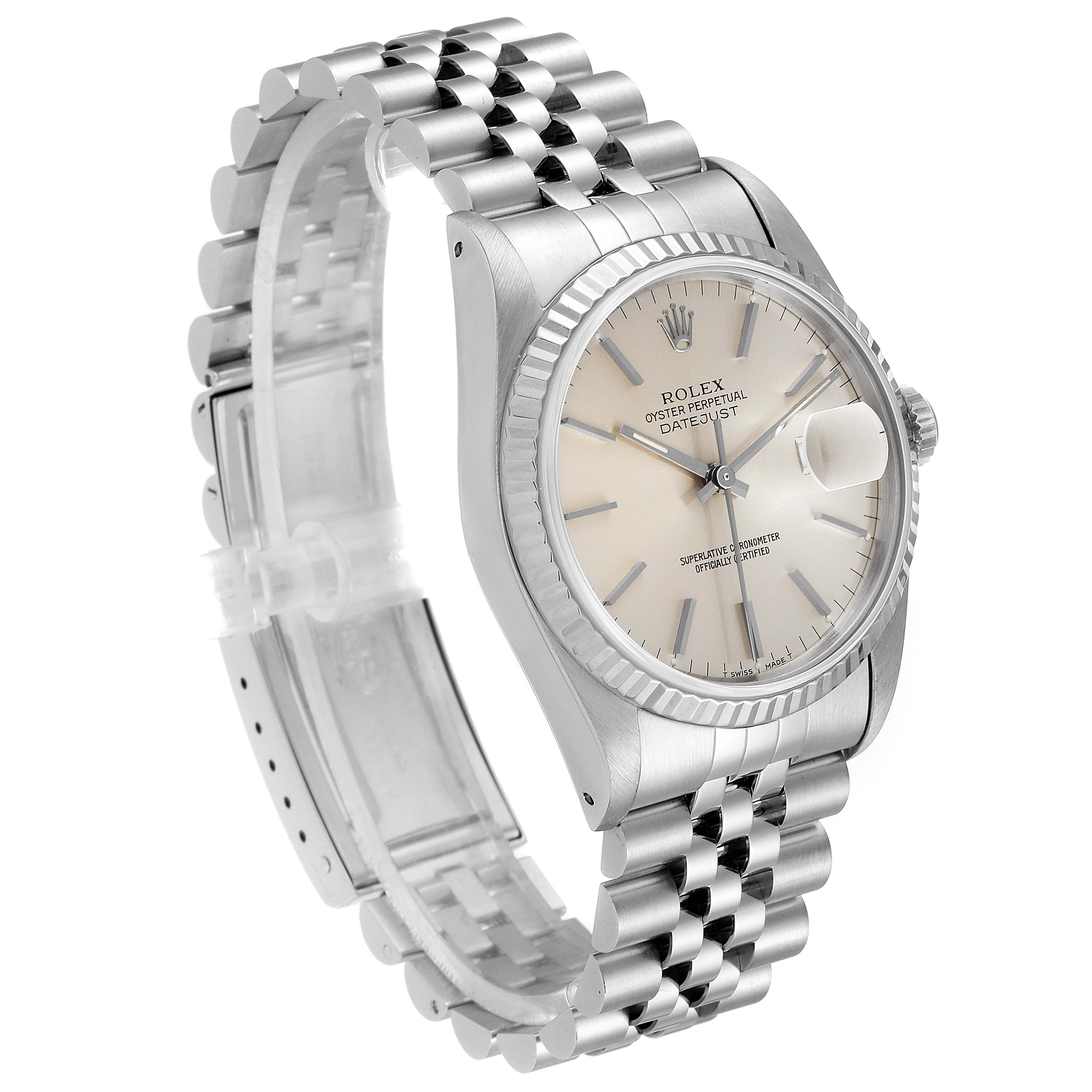 This image shows a Rolex Datejust 16234 Men's Stainless Steel Silver Dial 16234 Men's Stainless Steel Silver Dial watch at a three-quarter angle, displaying its face, bezel, and Jubilee bracelet.