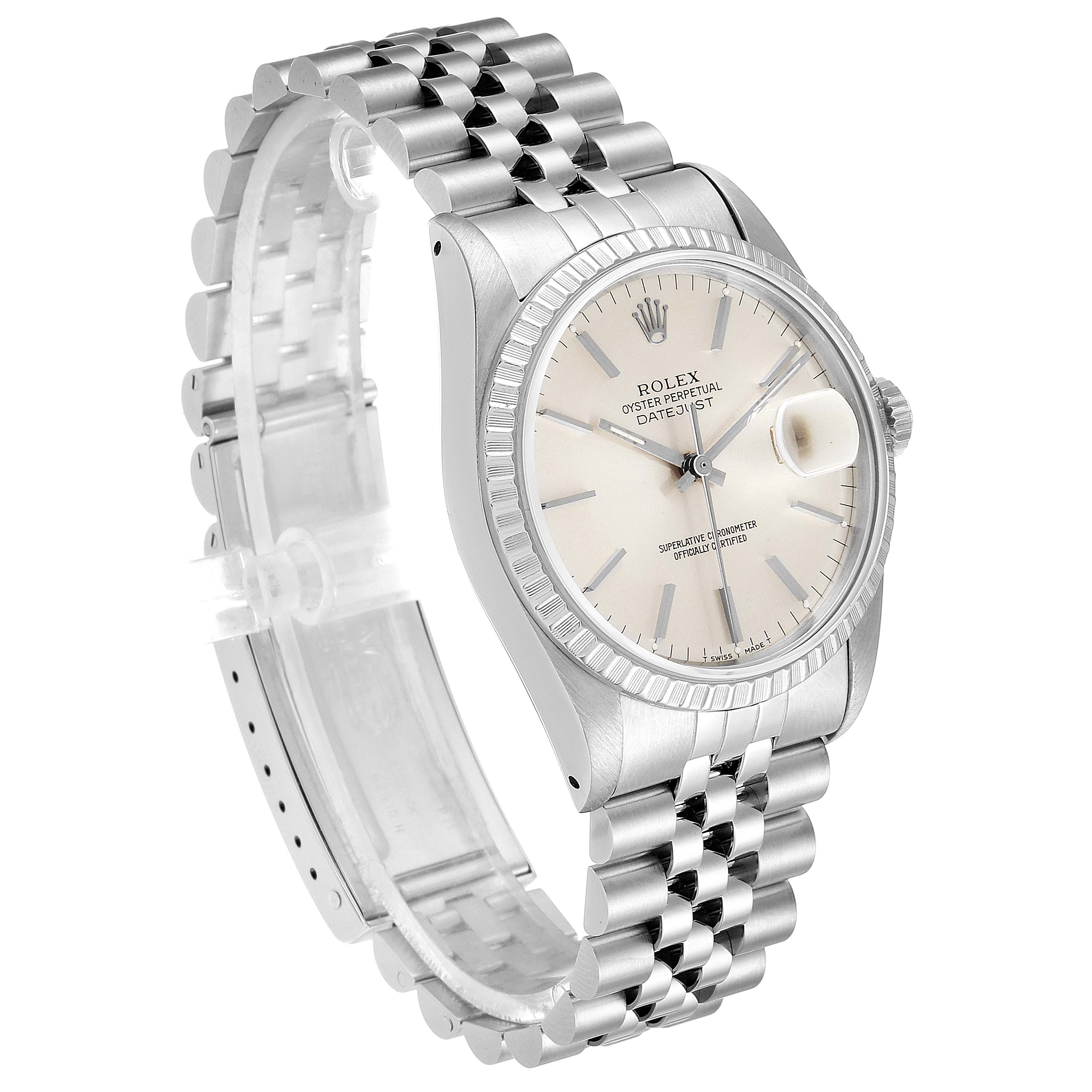 The image shows the side-angle view of a Rolex Datejust 16220 Men's Stainless Steel Silver Dial 16220 Men's Stainless Steel Silver Dial watch, highlighting its face, bezel, and bracelet.