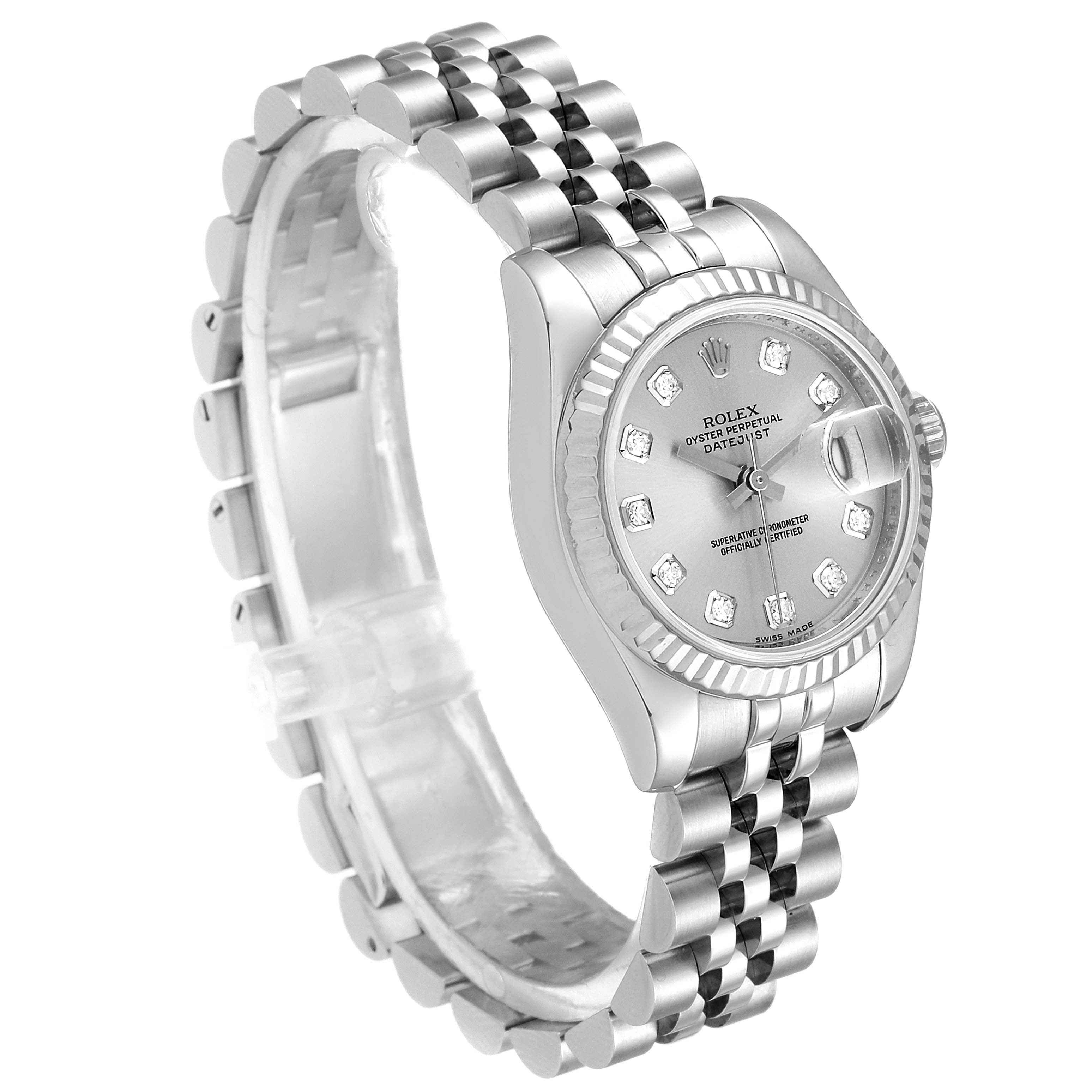 This Rolex Datejust 179174 Women
s Stainless Steel Silver Dial 179174 Women
s Stainless Steel Silver Dial watch is shown from a three-quarter angle, highlighting its bracelet, case, dial, and bezel.