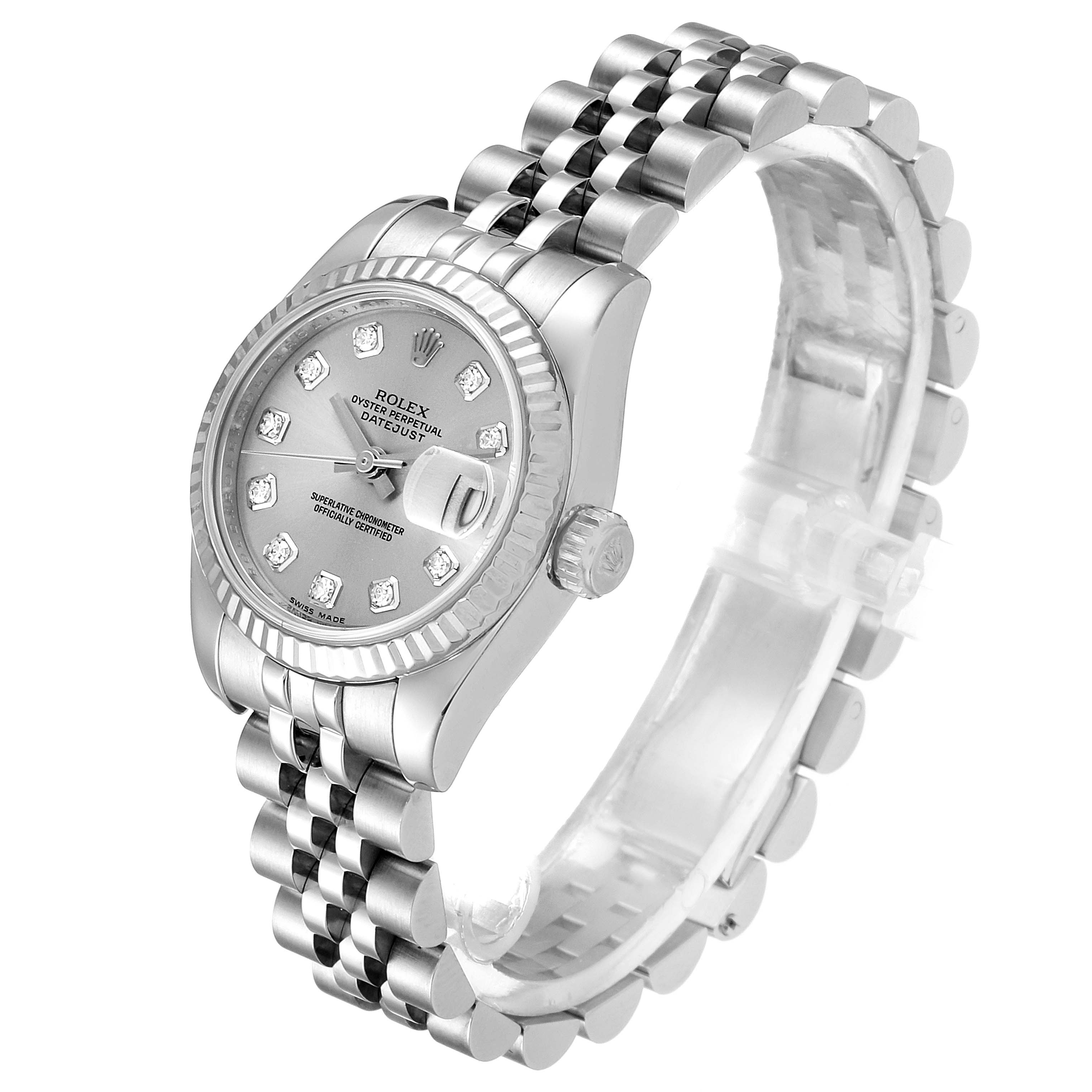 The image shows a Rolex Datejust 179174 Women
s Stainless Steel Silver Dial 179174 Women
s Stainless Steel Silver Dial watch at an angled side view, highlighting its bezel, dial, crown, and jubilee bracelet.