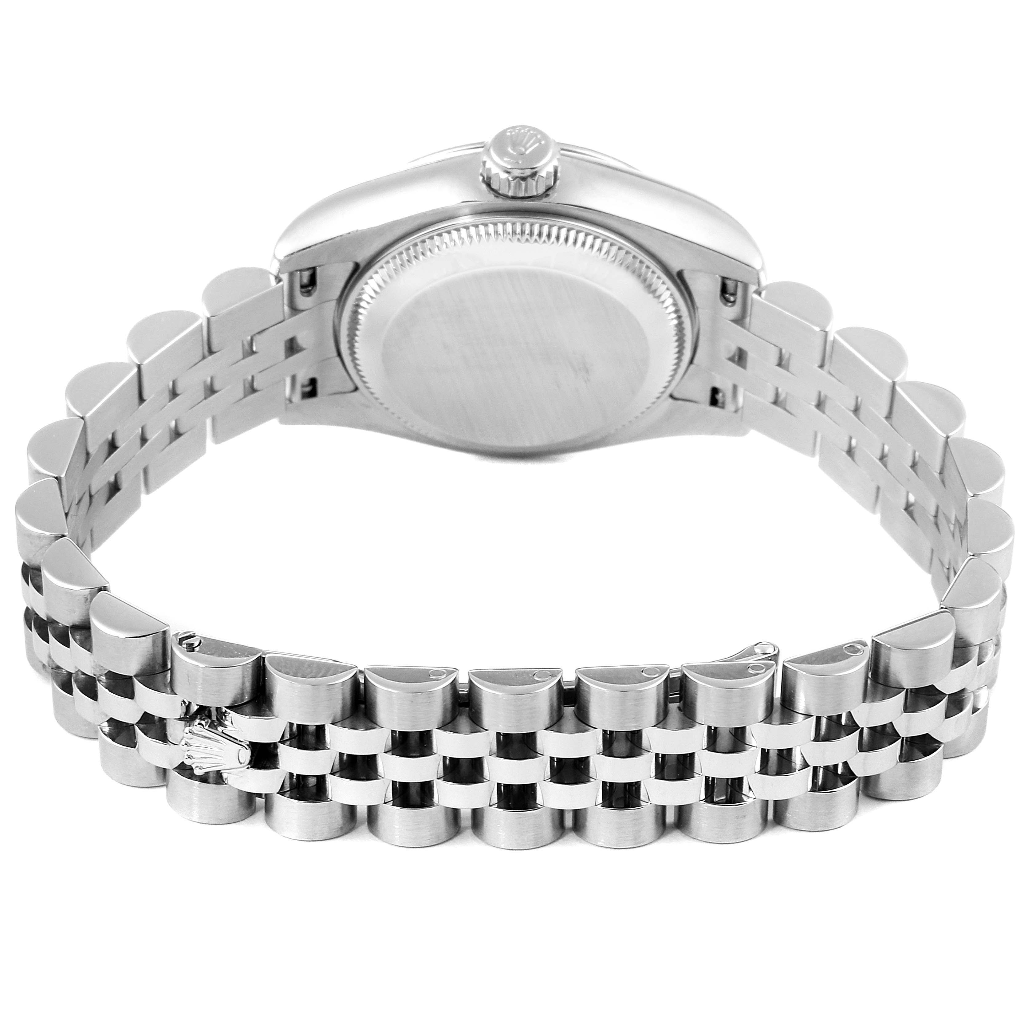 The image shows the back view of a Rolex Datejust 179174 Women
s Stainless Steel Silver Dial 179174 Women
s Stainless Steel Silver Dial watch, highlighting its bracelet and case back.