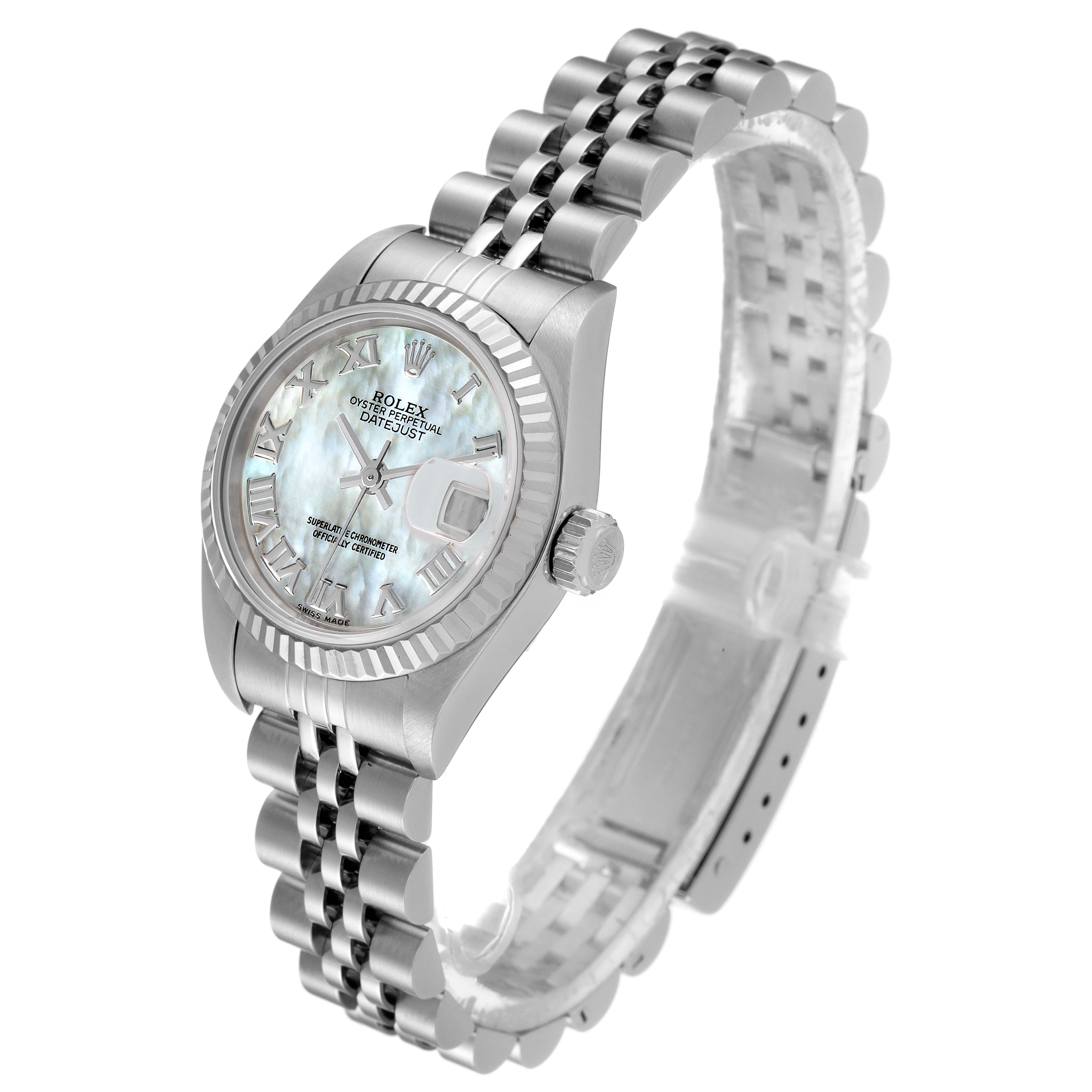 The image shows a Rolex Datejust 79174 Women
s Stainless Steel Mother of Pearl Dial 79174 Women
s Stainless Steel Mother of Pearl Dial watch angled slightly to the left, displaying its face, bezel, crown, and bracelet band.