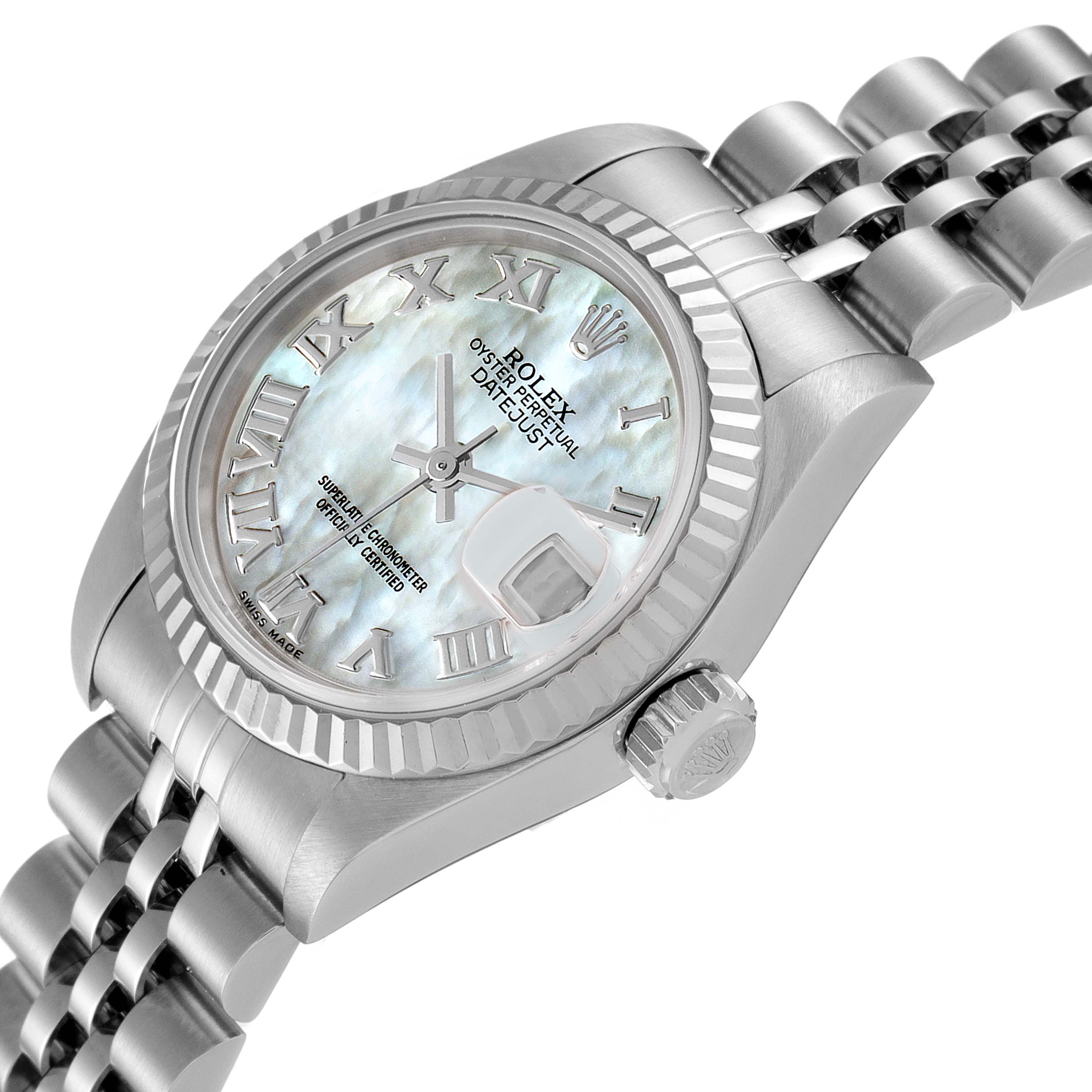 This image shows a Rolex Datejust 79174 Women
s Stainless Steel Mother of Pearl Dial 79174 Women
s Stainless Steel Mother of Pearl Dial watch from a slightly tilted side angle, highlighting the face, crown, and bracelet.