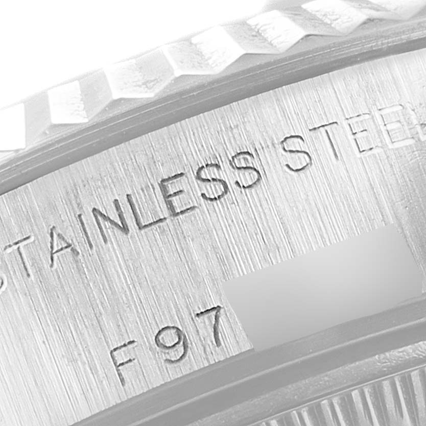 This image shows a close-up of the stainless steel engraved text and bezel detail of a Rolex Datejust 79174 Women
s Stainless Steel Mother of Pearl Dial 79174 Women
s Stainless Steel Mother of Pearl Dial model.