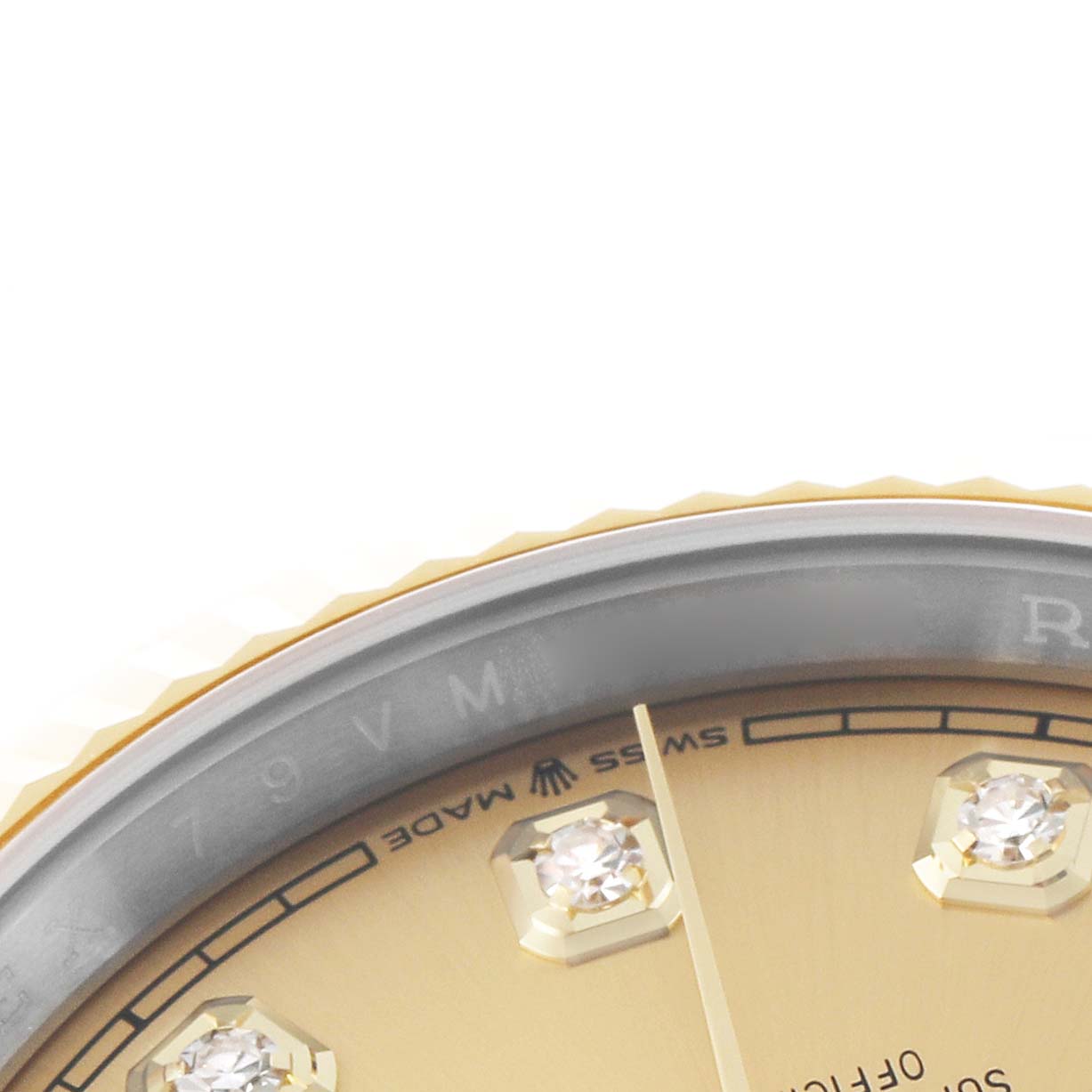 The image shows a close-up of the Rolex Datejust 126233 Men's Steel and Gold (two tone) Champagne Dial watch's bezel, part of the dial, and diamond markers.