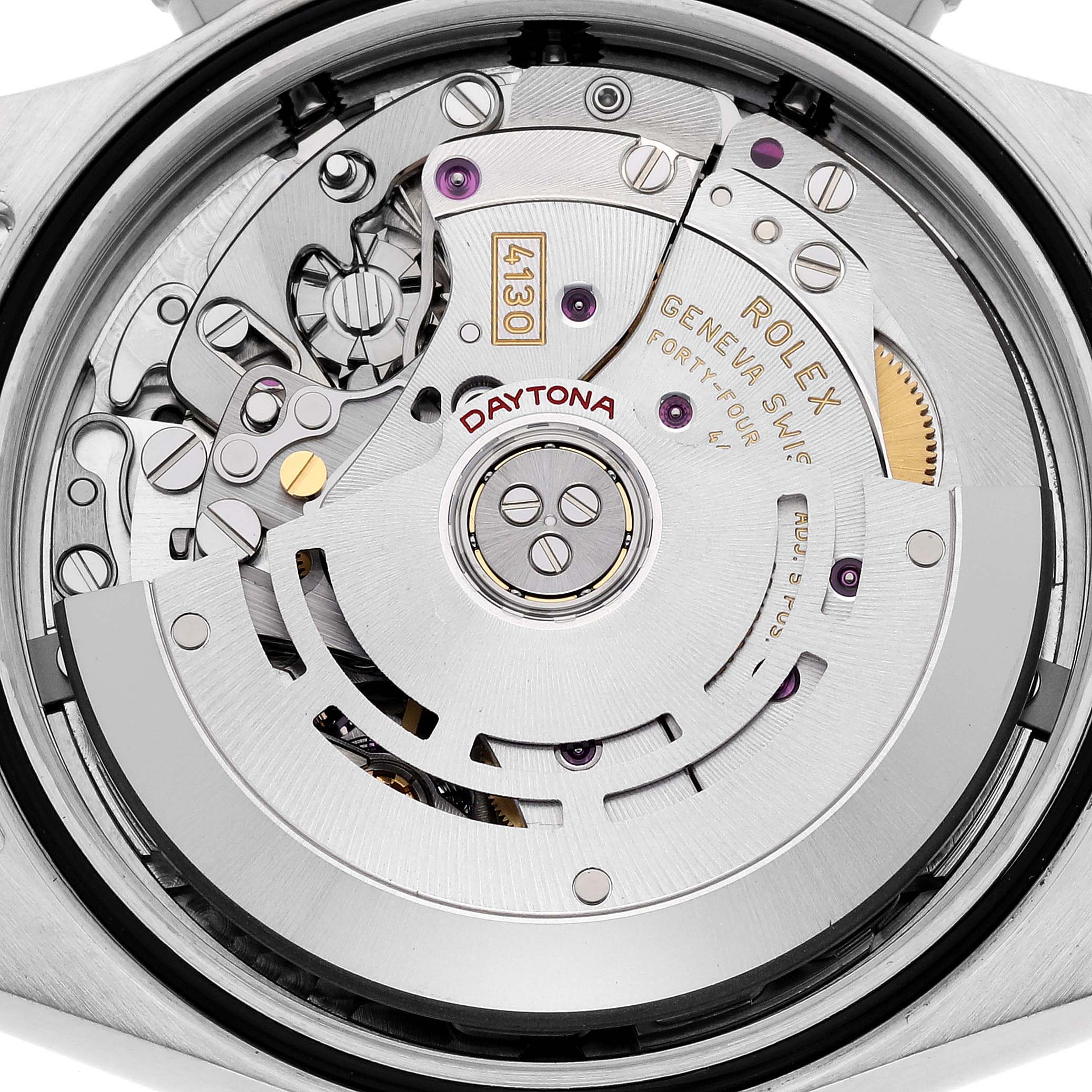 The image shows the internal mechanism of a Rolex Daytona 116500LN Men's Stainless Steel White Dial 116500LN Men's Stainless Steel White Dial watch from above, highlighting gears and the winding rotor.