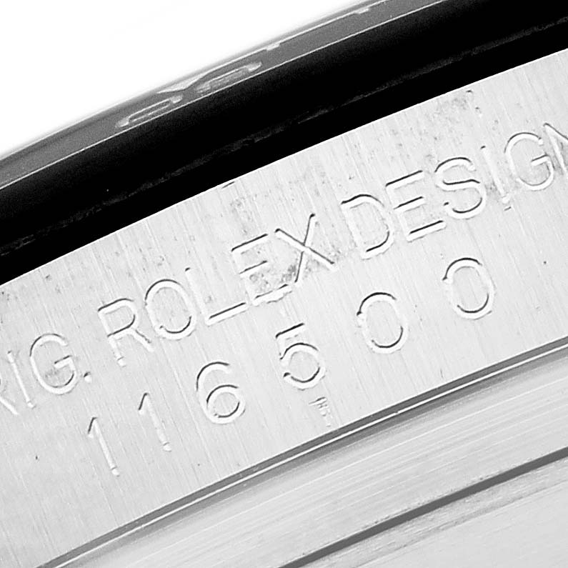 The image shows a close-up of the engraving on the bezel of a Rolex Daytona 116500LN Men's Stainless Steel White Dial 116500LN Men's Stainless Steel White Dial watch, highlighting "ROLEX DESIGN" and numbers.