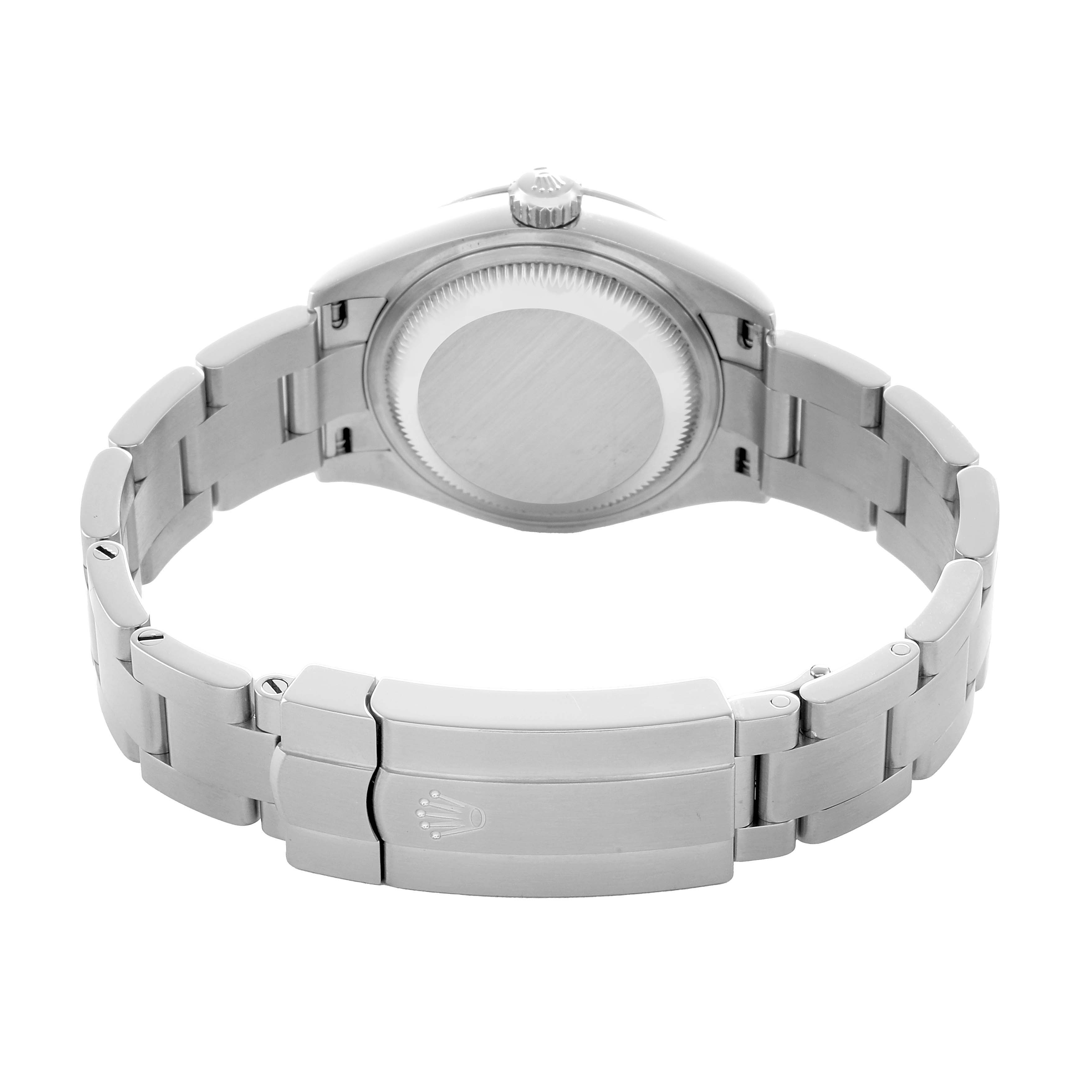 The image shows a rear view of the Oyster Perpetual Rolex, highlighting the case back and bracelet clasp.