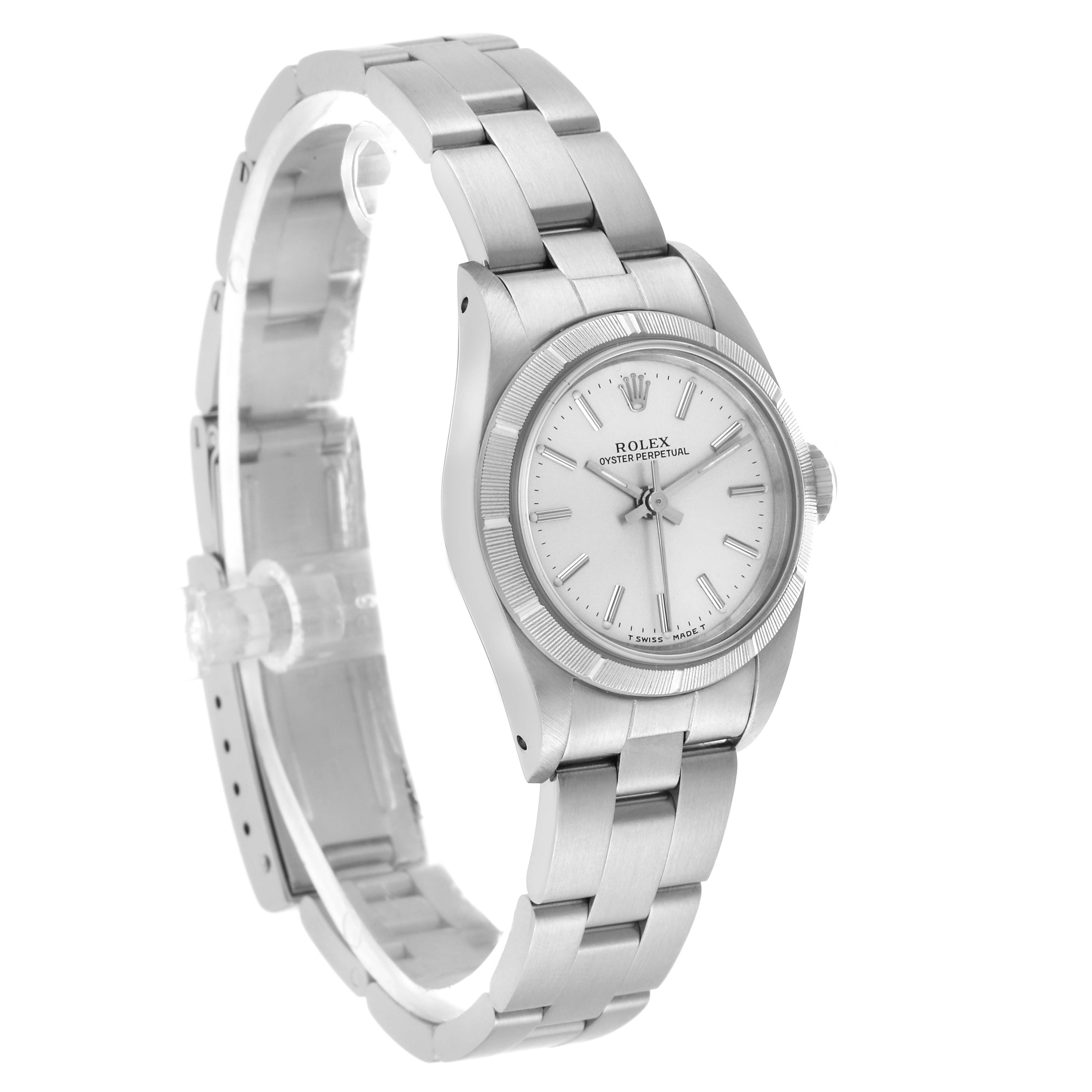The Rolex Oyster Perpetual 67230 Women's Stainless Steel Silver Dial watch is shown at an angled side view, displaying the face, bezel, and bracelet.