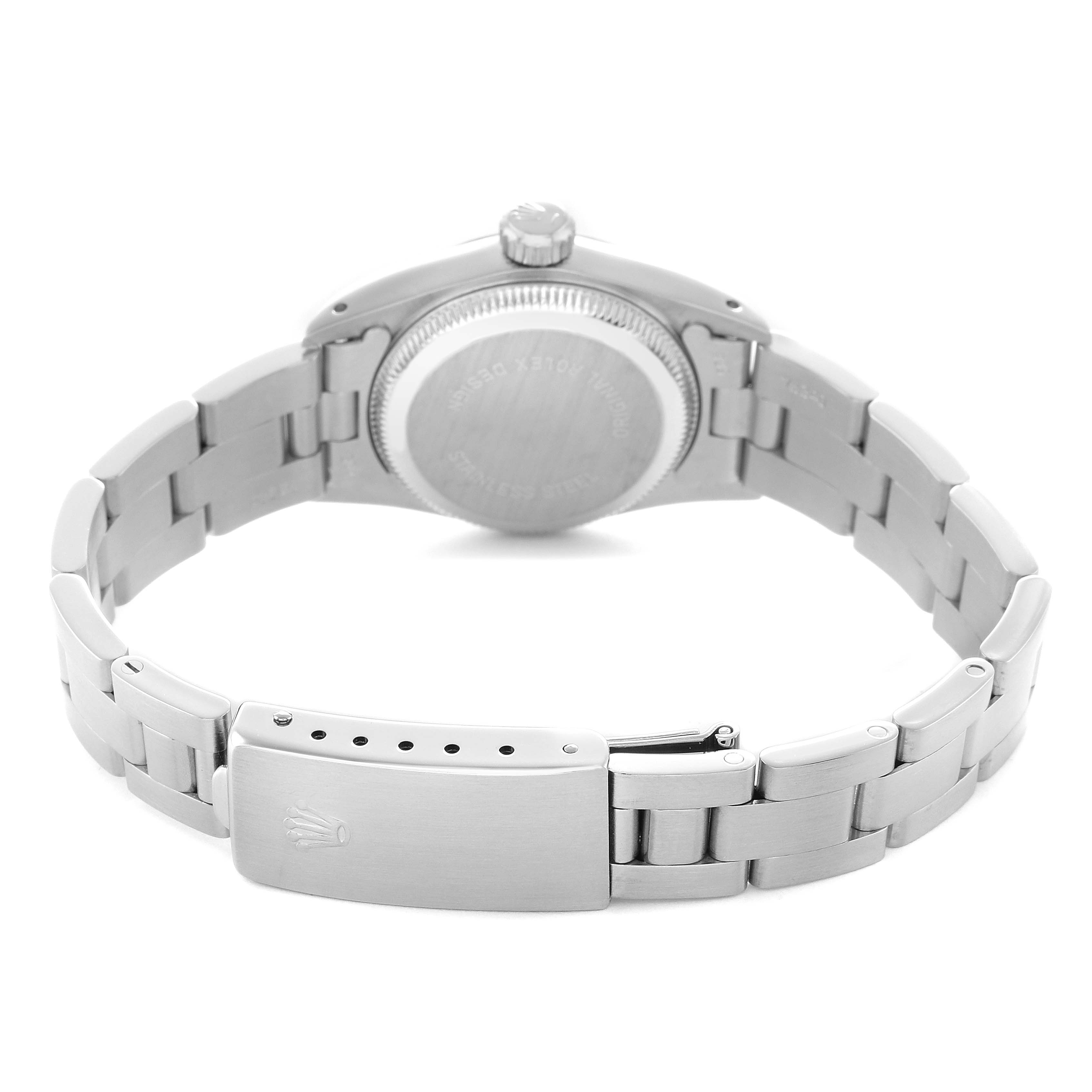 The image shows the back of a Rolex Oyster Perpetual 67230 Women's Stainless Steel Silver Dial, highlighting the clasp, bracelet, and case back from a rear angle.