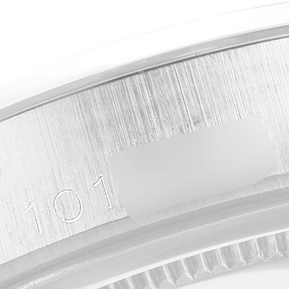 This image shows a close-up of the serial number area on the case of the Vintage Collection model by Rolex.