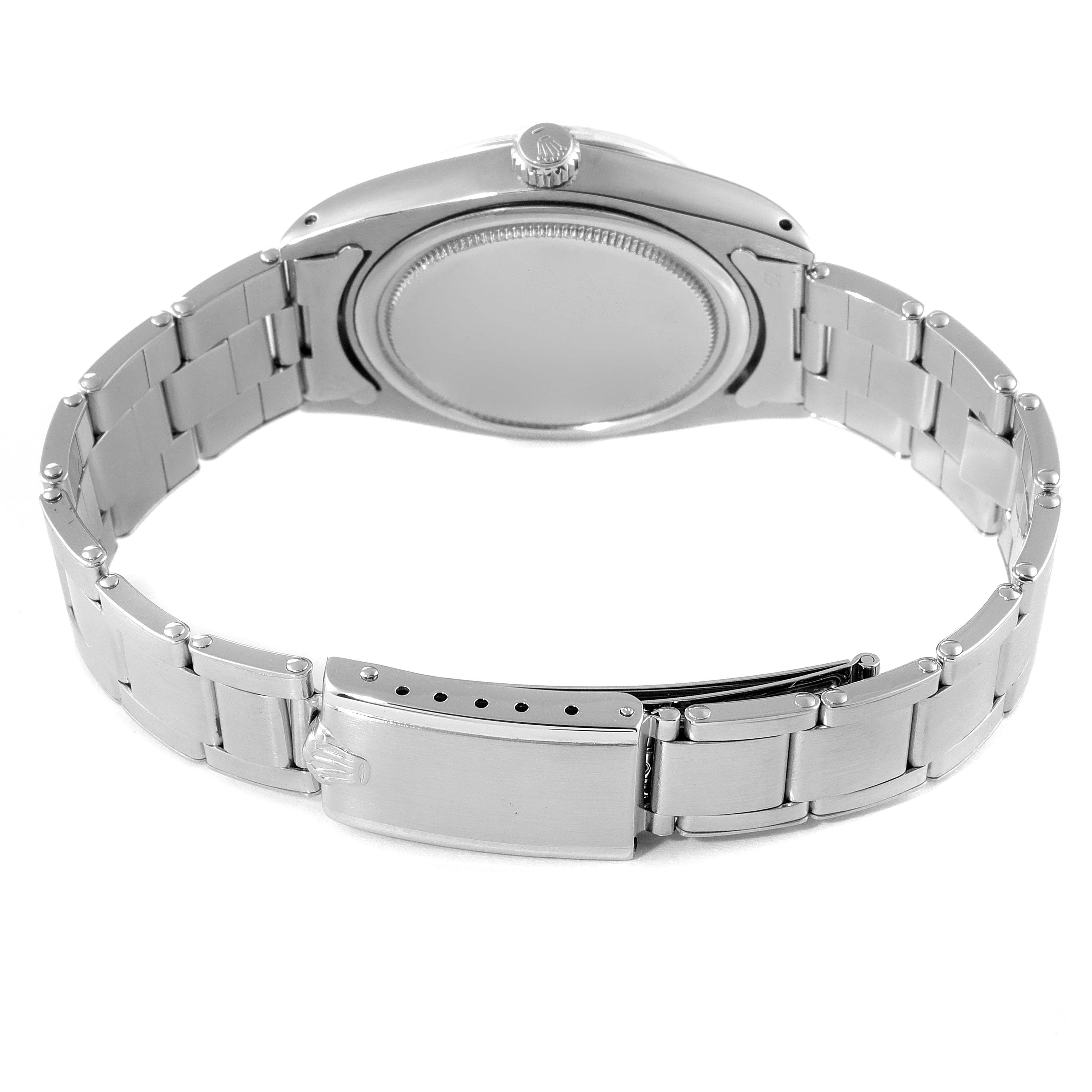 This image shows the back of the Rolex Vintage Collection 6694 Men's Stainless Steel Silver Dial 6694 Men's Stainless Steel Silver Dial watch, highlighting the case back, bracelet, and clasp.