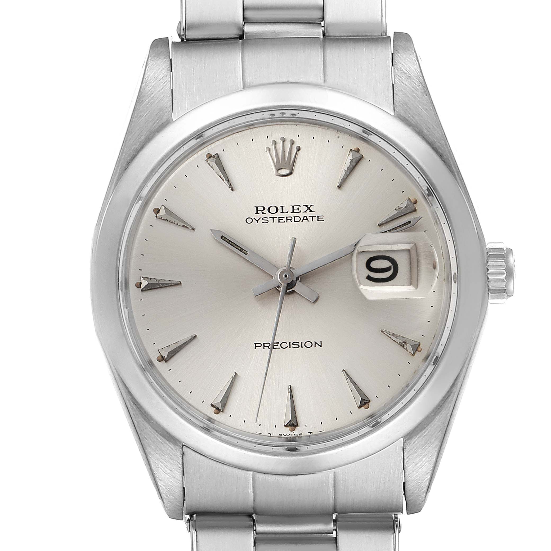 A close-up of the Rolex Vintage Collection 6694 Men's Stainless Steel Silver Dial 6694 Men's Stainless Steel Silver Dial model wristwatch shows the dial, crown, and part of the metal bracelet.