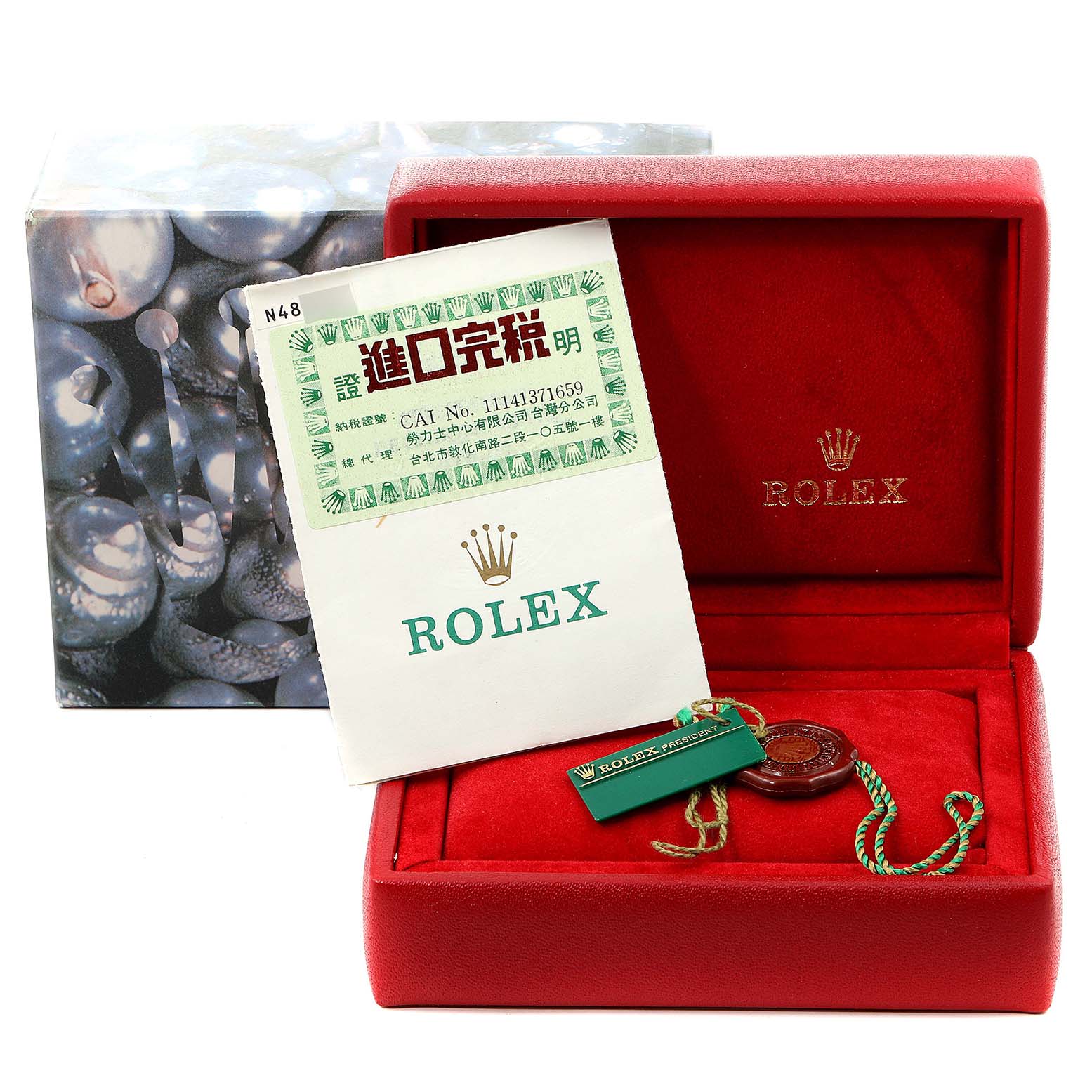 The image shows a Rolex President 69179 Women's White Gold Silver Dial 69179 Women's White Gold Silver Dial model watch box, a booklet, and a tag.