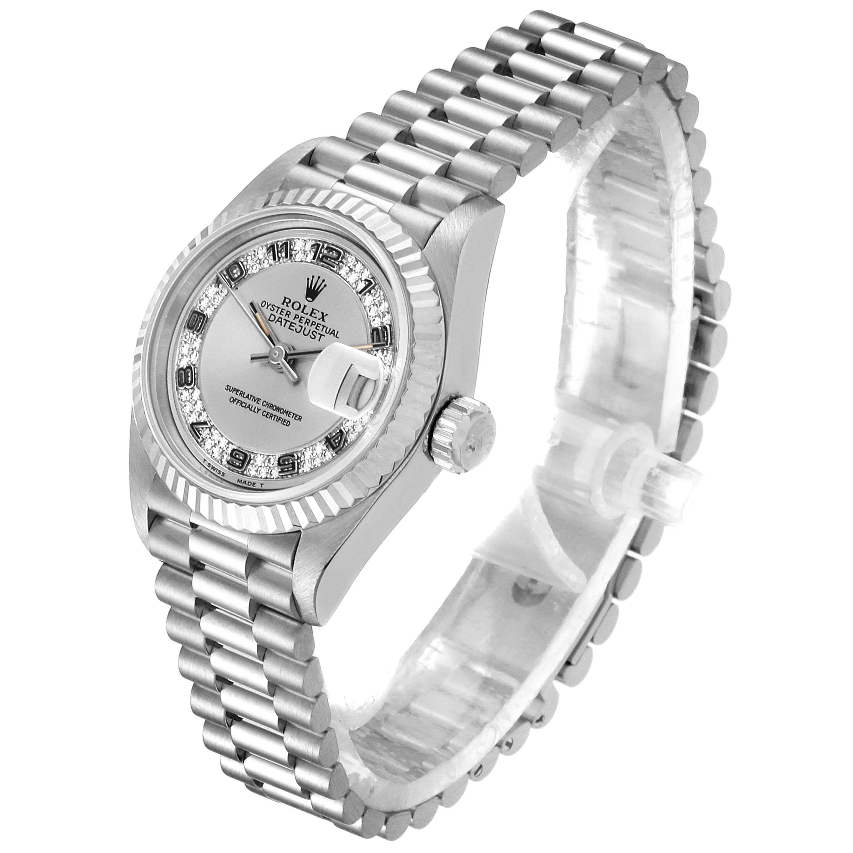 This image shows a President model Rolex watch at a three-quarter view, highlighting its dial, bezel, and bracelet.