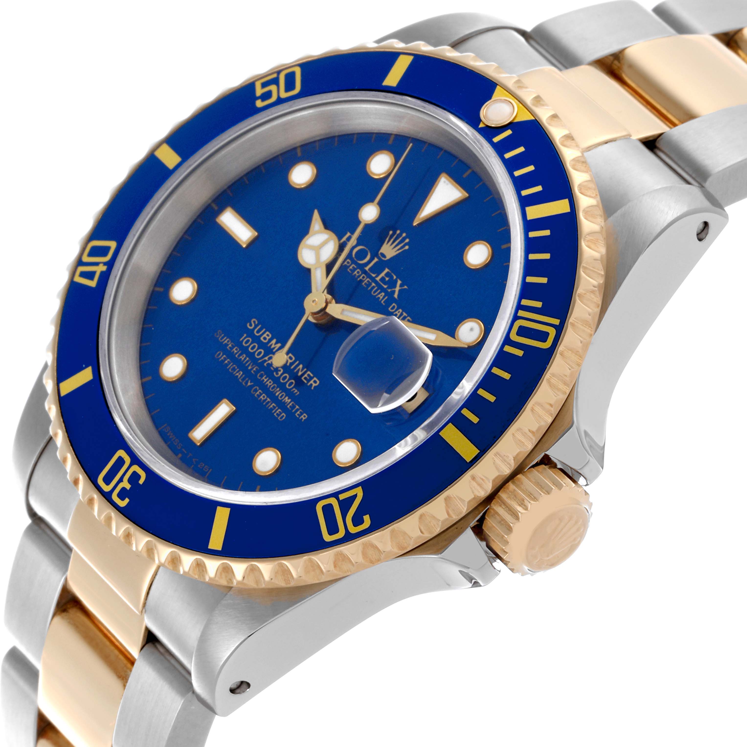 The Rolex Submariner 16613 Men's Steel and Gold (two tone) Blue Dial 16613 Men's Steel and Gold (two tone) Blue Dial is shown at a 3/4 angle displaying the blue dial, bezel, and part of the bracelet.