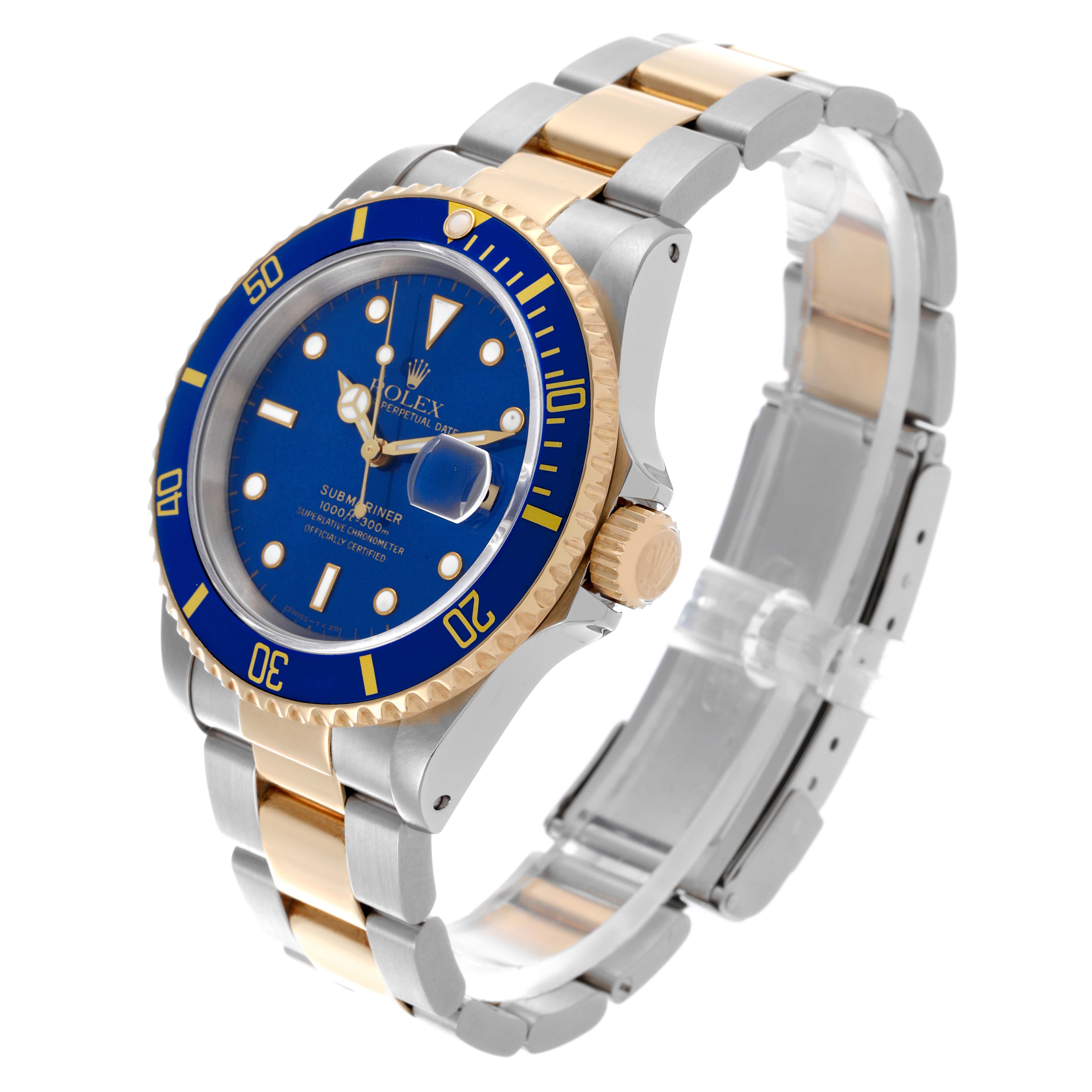 The Rolex Submariner 16613 Men's Steel and Gold (two tone) Blue Dial 16613 Men's Steel and Gold (two tone) Blue Dial is shown at a three-quarter angle, displaying the dial, bezel, crown, and bracelet.