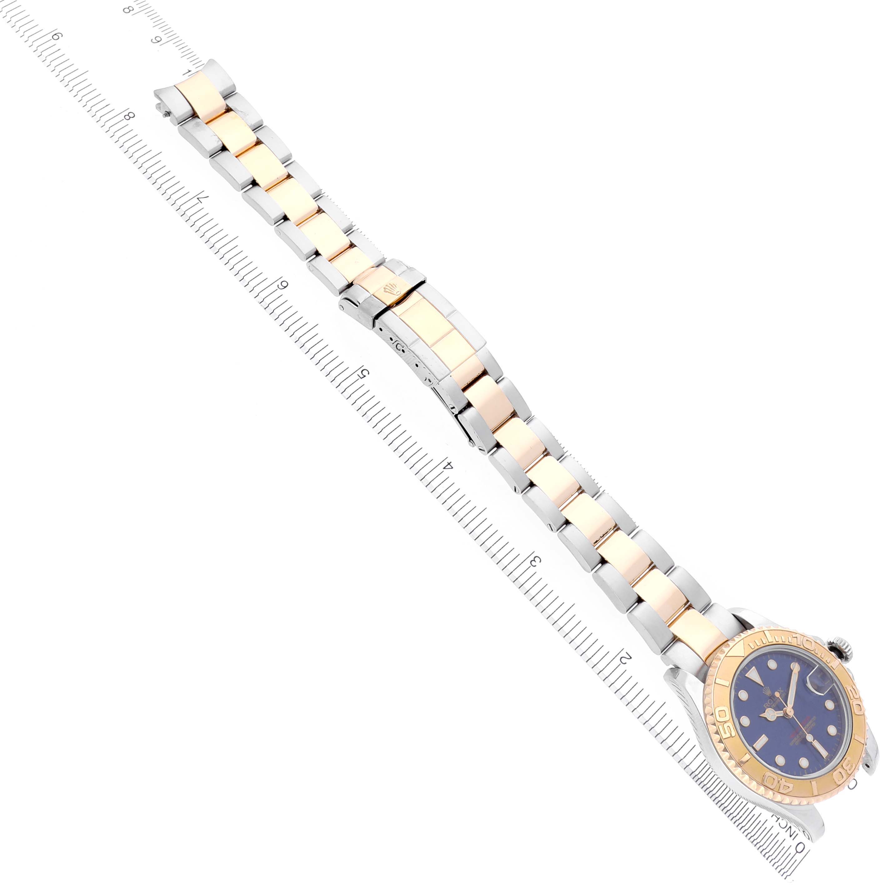 The image shows a Rolex Yacht-Master 68623 Men's Steel and Gold (two tone) Blue Dial 68623 Men's Steel and Gold (two tone) Blue Dial watch displaying its full length with the band and face at a diagonal angle.