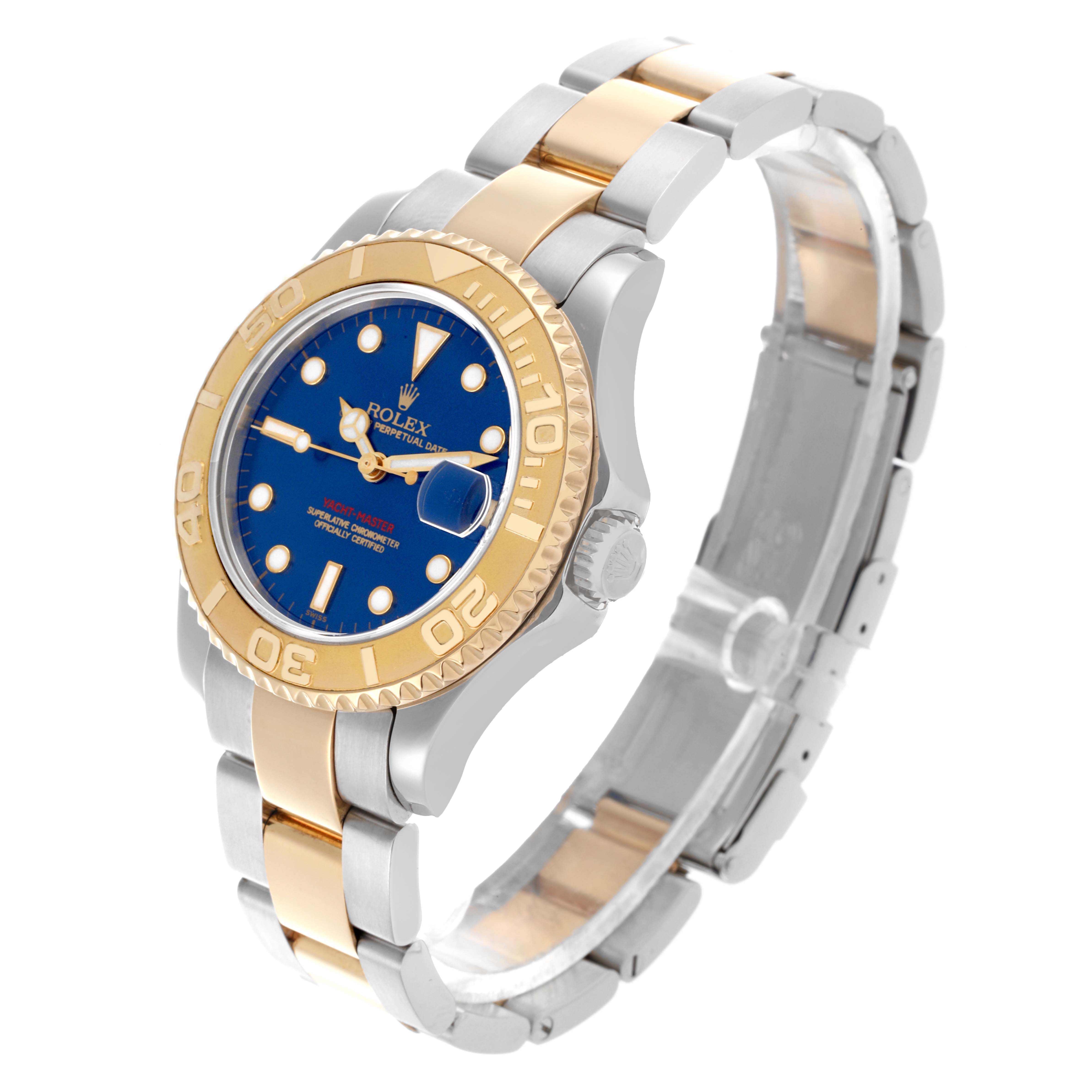 The Rolex Yacht-Master 68623 Men's Steel and Gold (two tone) Blue Dial 68623 Men's Steel and Gold (two tone) Blue Dial watch is shown at a three-quarter angle, highlighting the bezel, crown, dial, and bracelet.