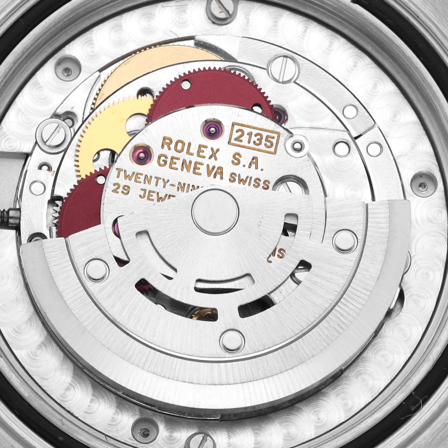 The image shows the movement mechanism of the Rolex Yacht-Master 68623 Men's Steel and Gold (two tone) Blue Dial 68623 Men's Steel and Gold (two tone) Blue Dial watch, featuring gears and jewels from a top view.