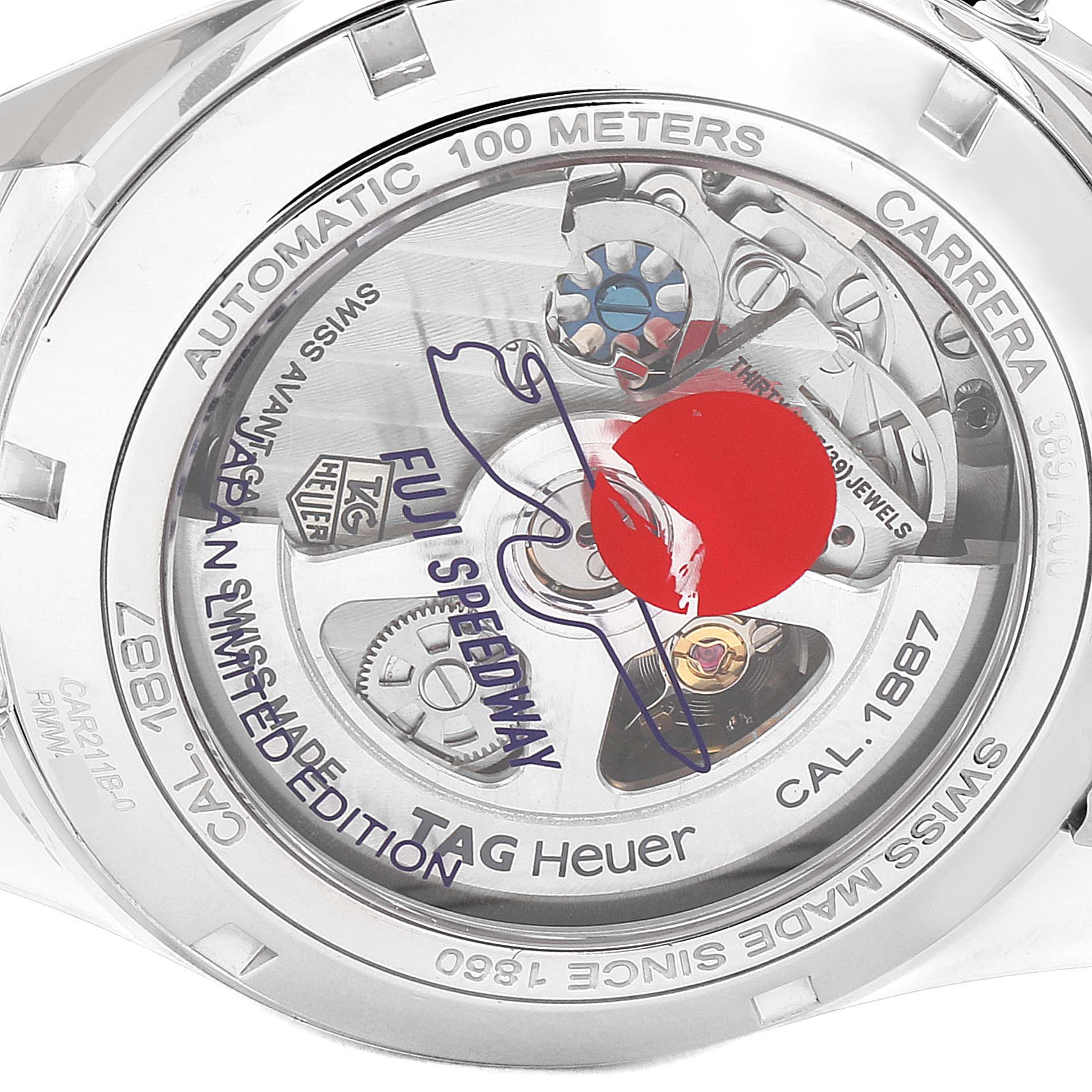 The image shows the back view of a Tag Heuer Carrera watch, highlighting its automatic movement and inner mechanisms.